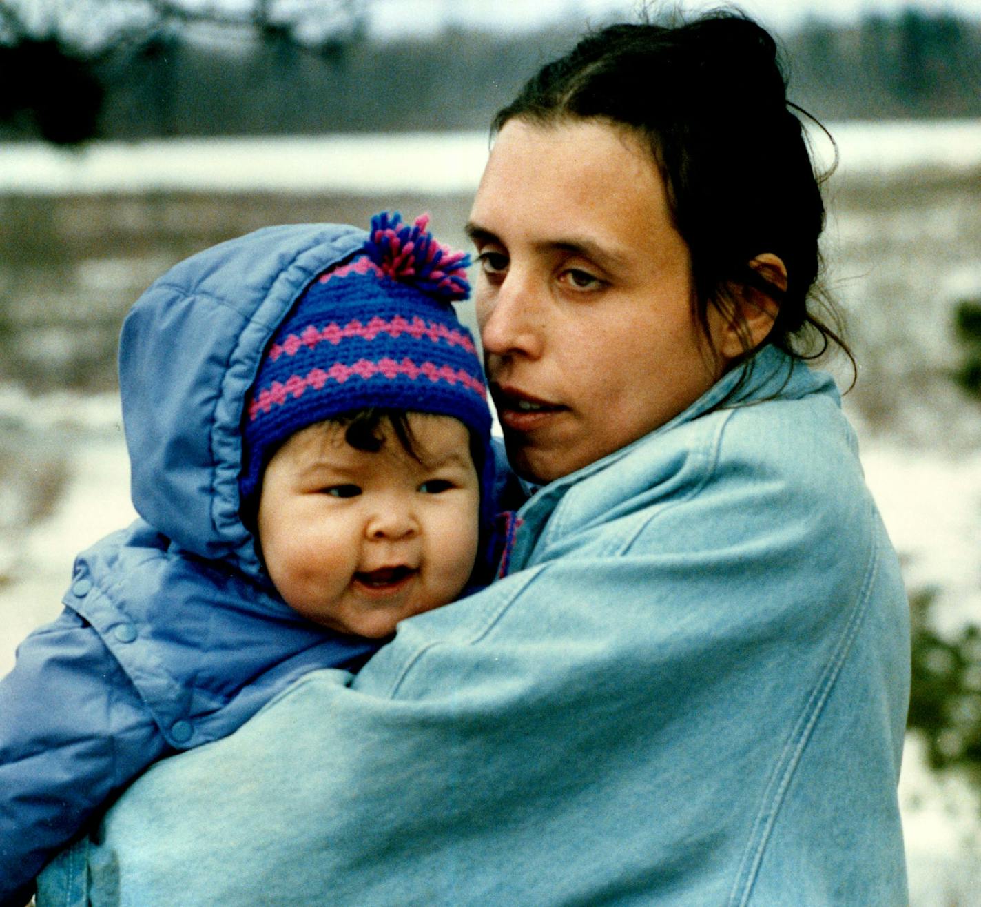 May 14, 1989 LaDuke and 7-month-old daughter Wassyabin at White Earth conservation.