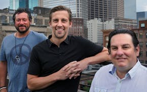 Blake Baratz, Luke Inveiss and Mike Zweugbaum, founders of the Institute for Athletes, on the roof of their building in downtown Minneapolis. brian.pe
