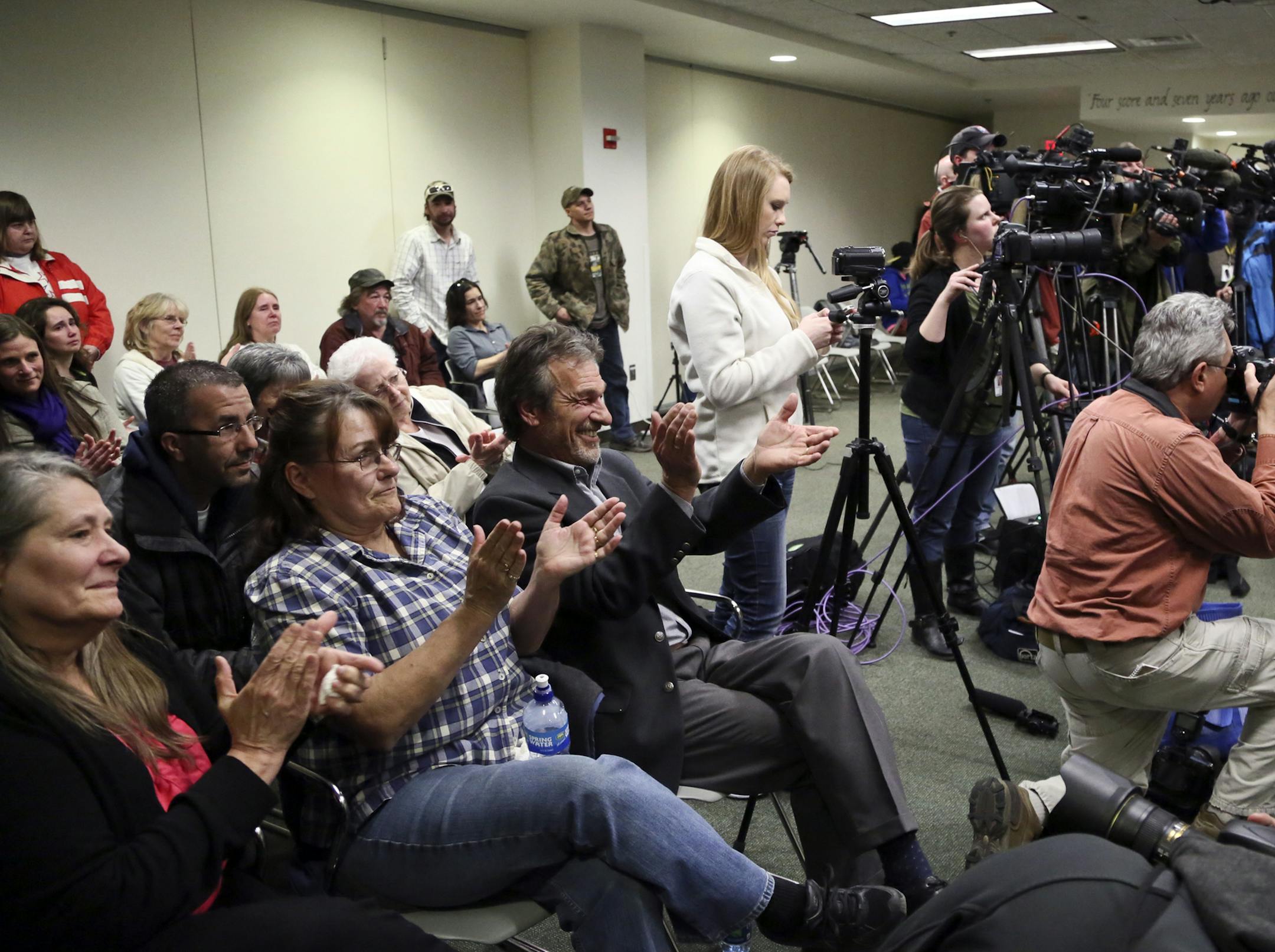 Friends and family members of Nick Brady and Haile Kifer applaud law enforcement members involved in the investigation during a press conference, after Byron Smith was guilty on all four counts in the murders of 17-year-old Nick Brady and 18-year-old Haile Kifer at the Morrison County Courthouse in Little Falls Tuesday, April 29, 2014. ](DAVID JOLES/STARTRIBUNE) djoles@startribunemurders The murder trial of Byron Smith in the deaths of 17-year-old Nick Brady and 18-year-old Haile Kifer at the Mo