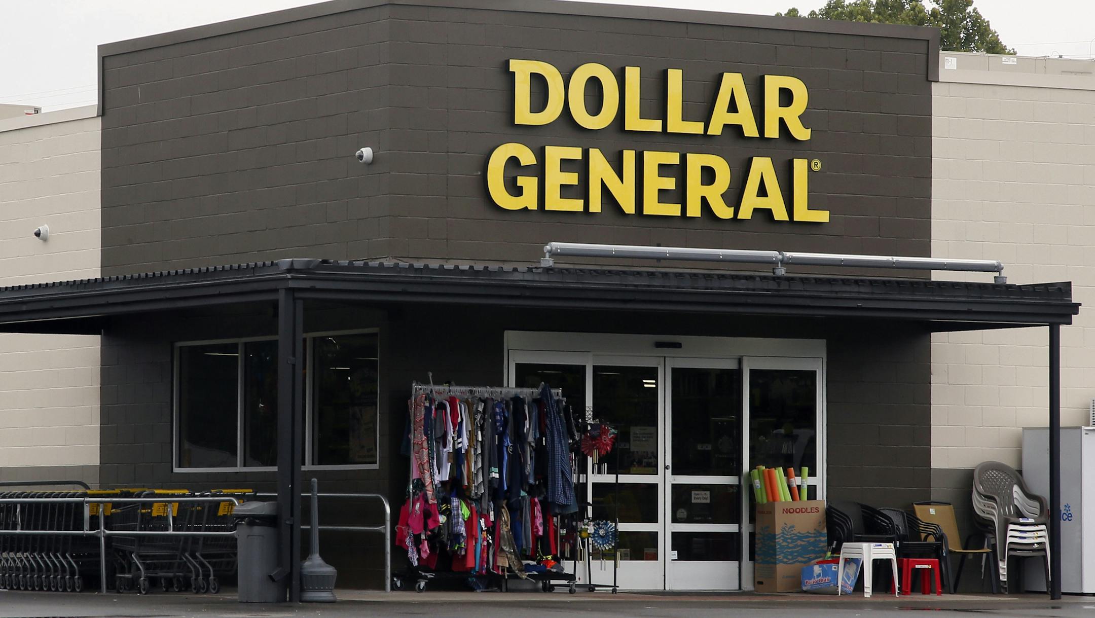 FILE- In this Aug. 3, 2017, file photo the Dollar General store is pictured in Luther, Okla. Dollar General reports financial results Thursday, Aug. 29, 2019. (AP Photo/Sue Ogrocki, File)