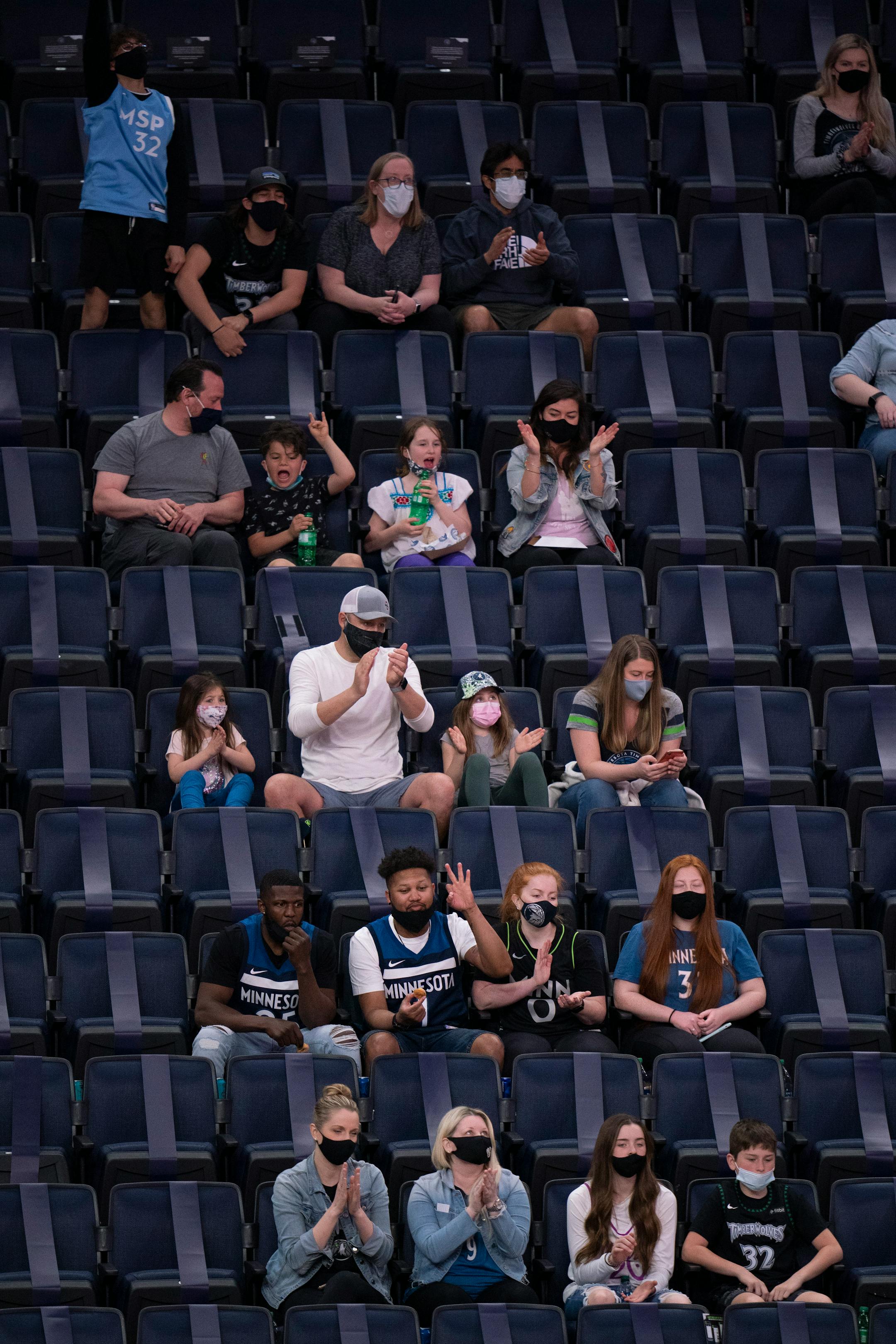 Fans in the lower level reacted to a Timberwolves basket in the first quarter.
