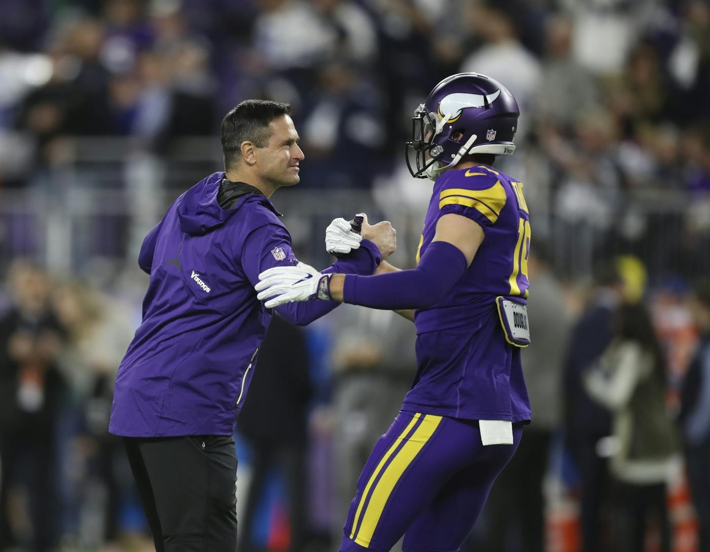 The Vikings interim head coach, Mike Priefer, greeted Vikings wide receiver Adam Thielen during warmups before Thursday night's game against Dallas at U.S. Bank Stadium.