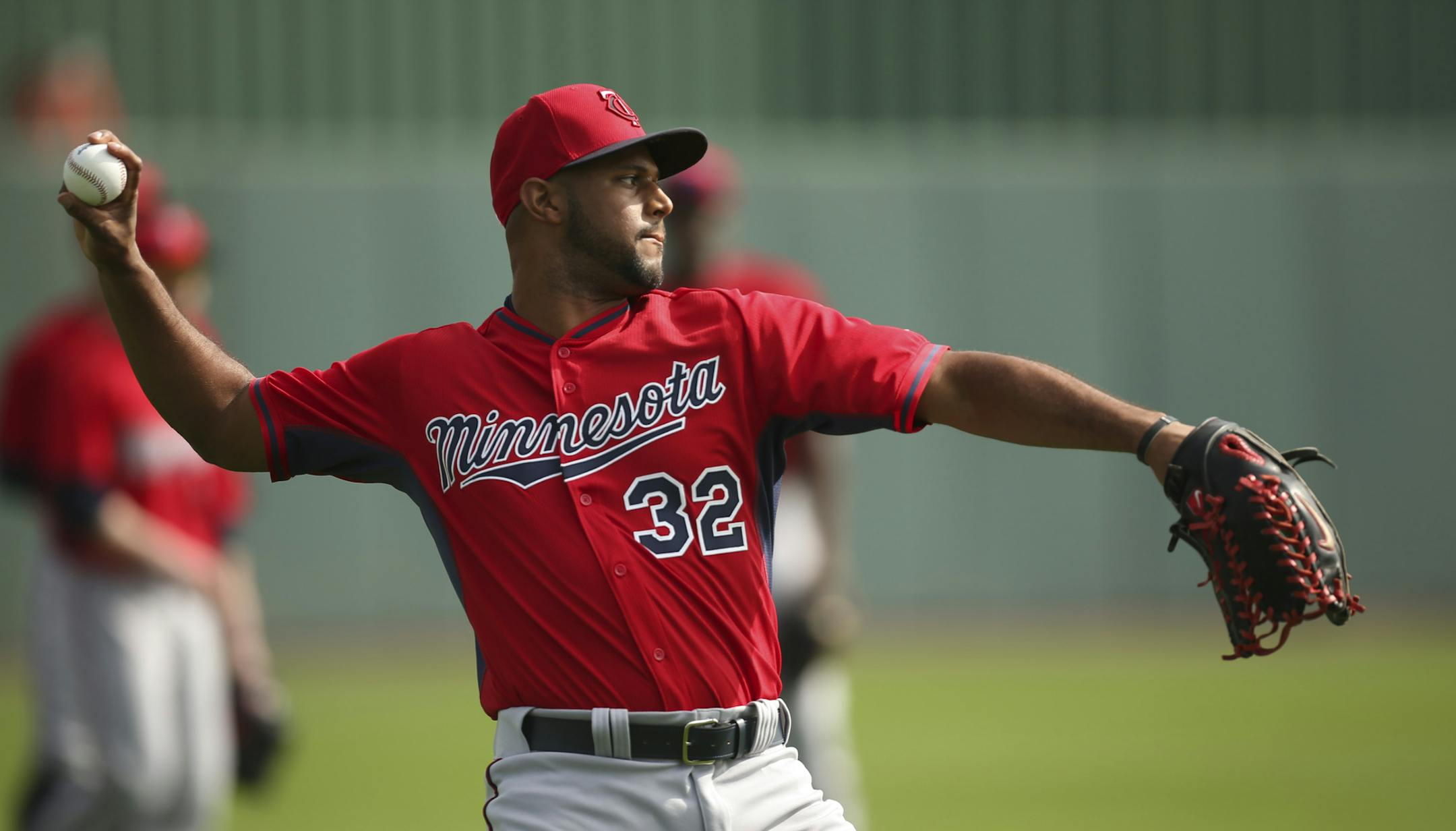Minnesota Twins center fielder Aaron Hicks threw after fielding a grounder during a workout for outfielders Saturday morning at Hammond Stadium. ] JEFF WHEELER &#x2022; jeff.wheeler@startribune.com Finally, the entire Twins squad worked out at training camp on Saturday, February 28, 2015 in Fort Myers, FL.