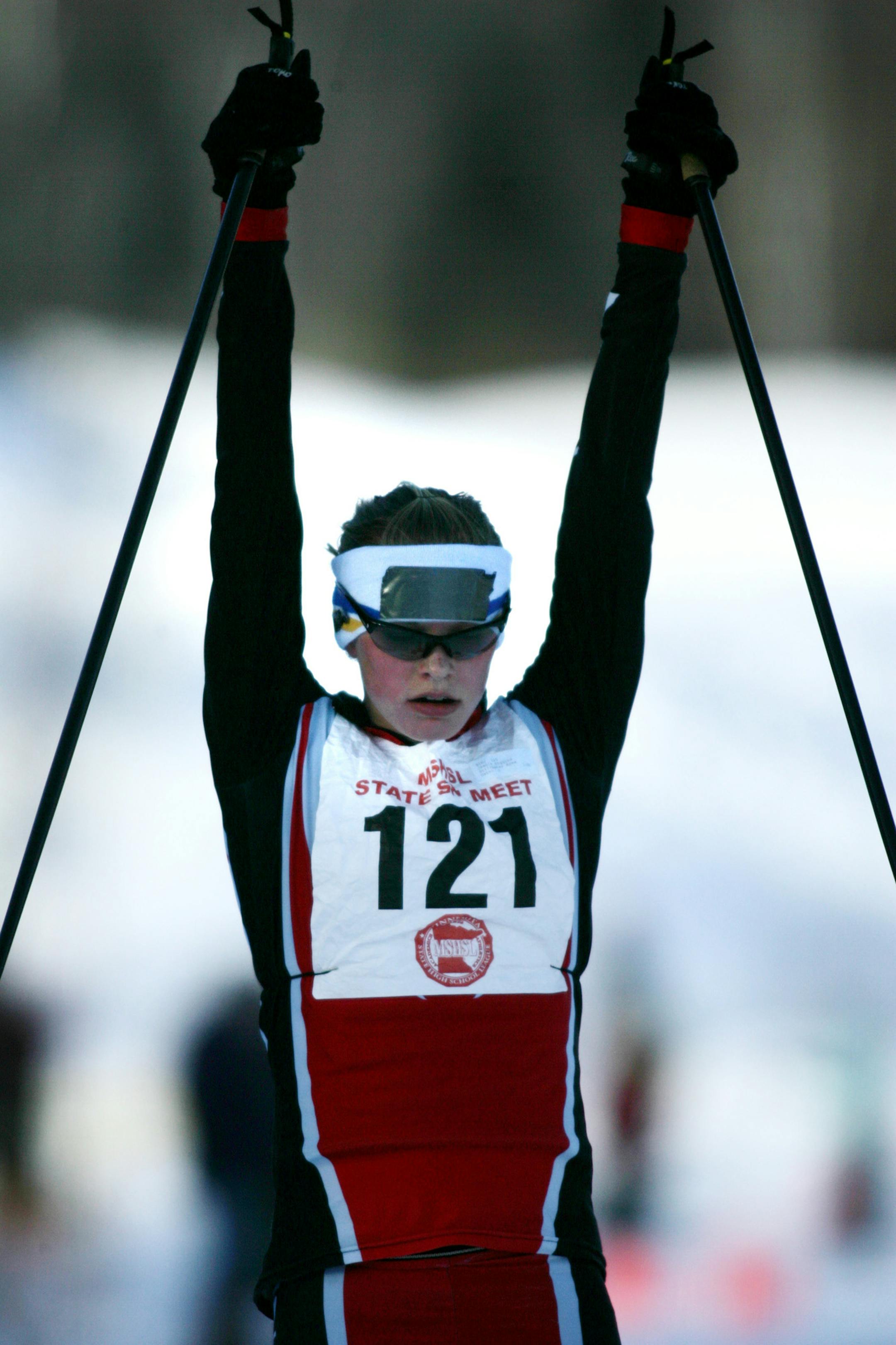 JENNIFER SIMONSON ï jsimonson@startribune.com Biwabik, MN-Feb. 15, 2008] Stillwater Area High School sophomore Jessie Diggins celebrated after crossing the finish line first during the classic race at the State Nordic Ski Racing Meet at Giants Ridge.