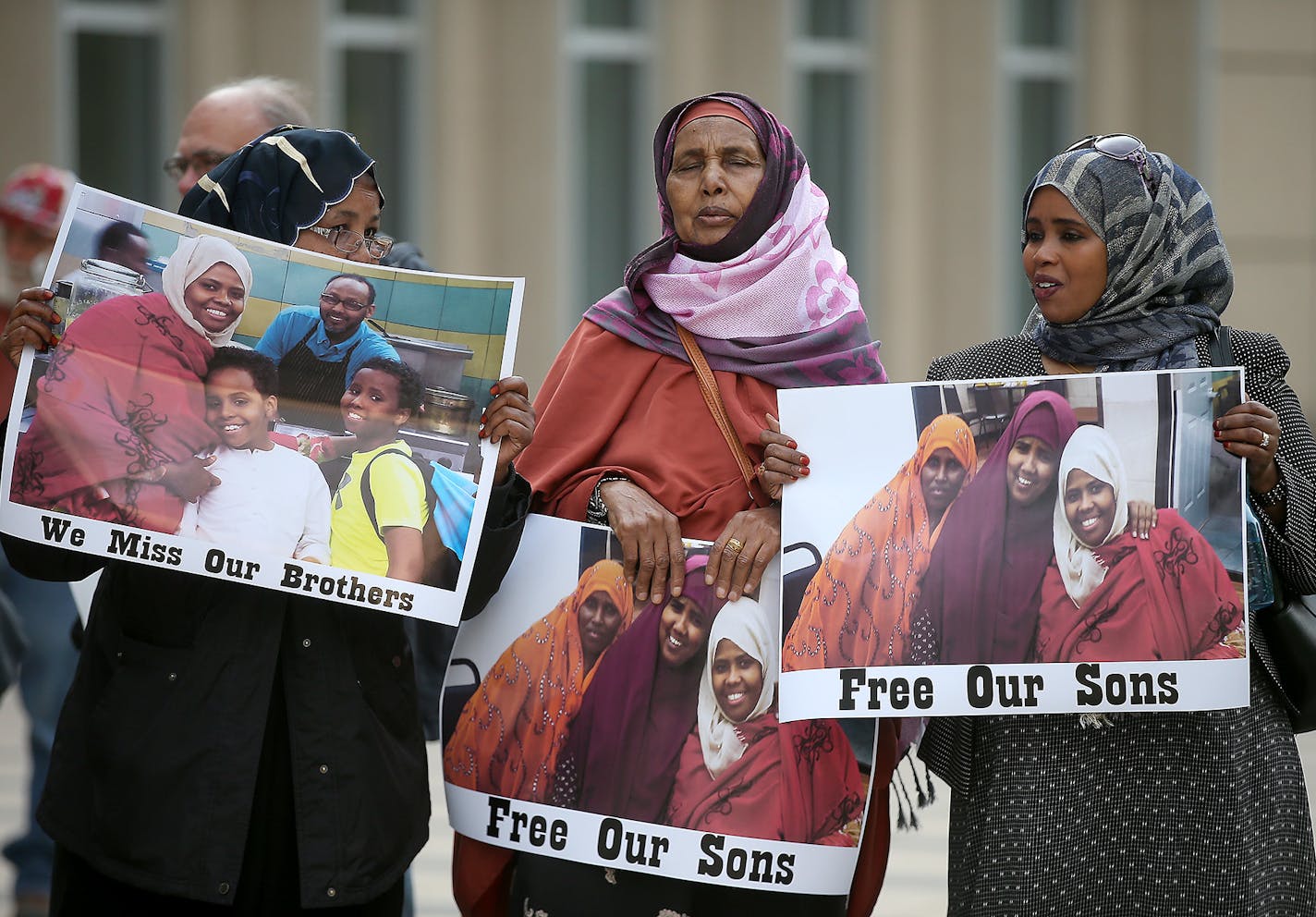 Supporters and family members of young Somali men standing trial, stood for a small protest before the opening day of the ISIL recruit trial, in front of the United States Courthouse, Monday, May 9, 2016 in Minneapolis, MN. ] (ELIZABETH FLORES/STAR TRIBUNE) ELIZABETH FLORES &#x2022; eflores@startribune.com