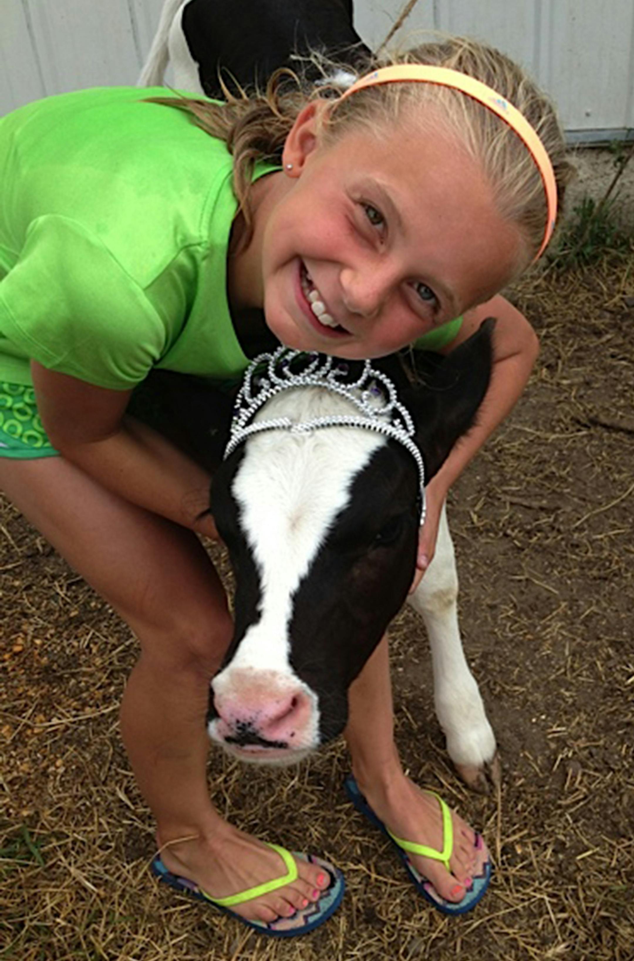 Sarah Olson, Blaine cross-country, and her pet cow, Freedom