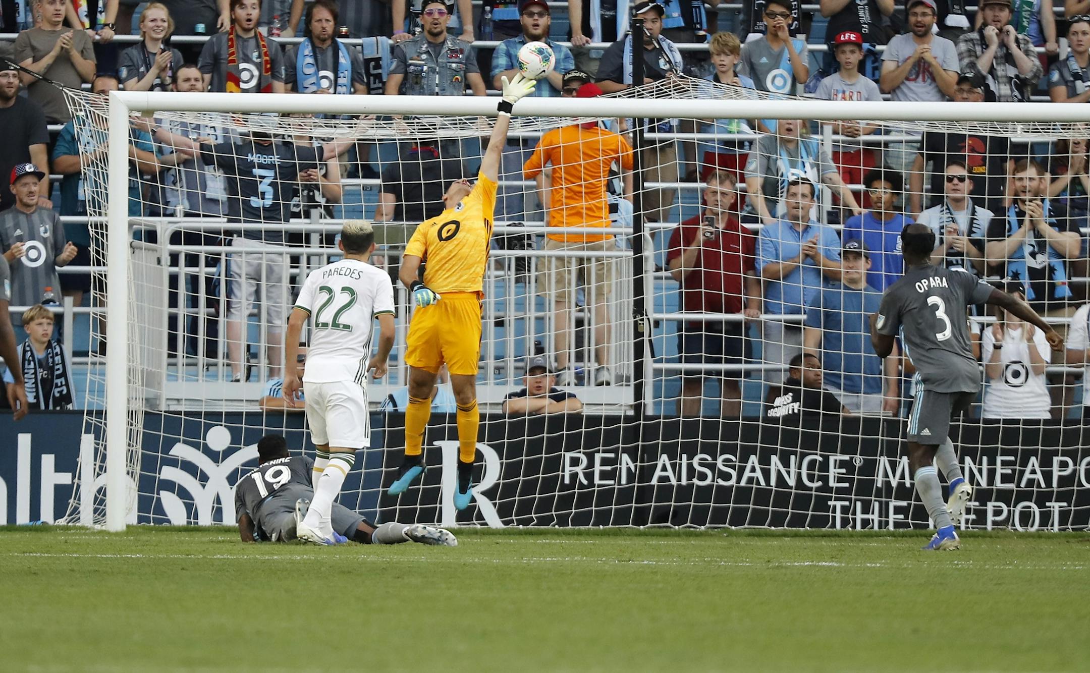 Minnesota United goalkeeper Vito Mannone (1) jumps high for a save during the first half.