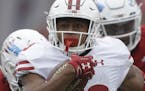 Wisconsin running back Jonathan Taylor (23) runs the first half of an NCAA college football game against Indiana, Nov. 4, 2017, in Bloomington, Ind. (