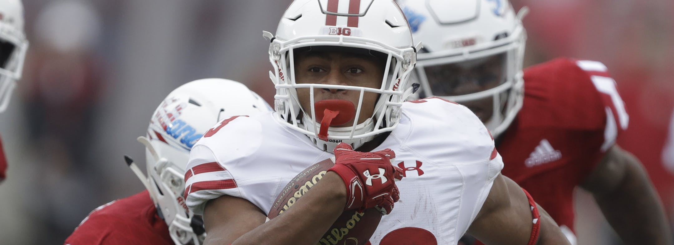 Wisconsin running back Jonathan Taylor (23) runs the first half of an NCAA college football game against Indiana, Nov. 4, 2017, in Bloomington, Ind. (AP Photo/Darron Cummings) ORG XMIT: INDC1