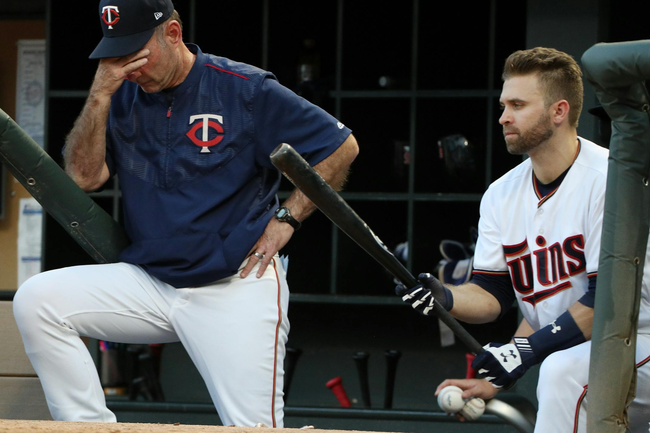 Minnesota Twins manger Paul Molitor and former Minnesota Twins second baseman Brian Dozier (2) watched from the dugout earlier this season.