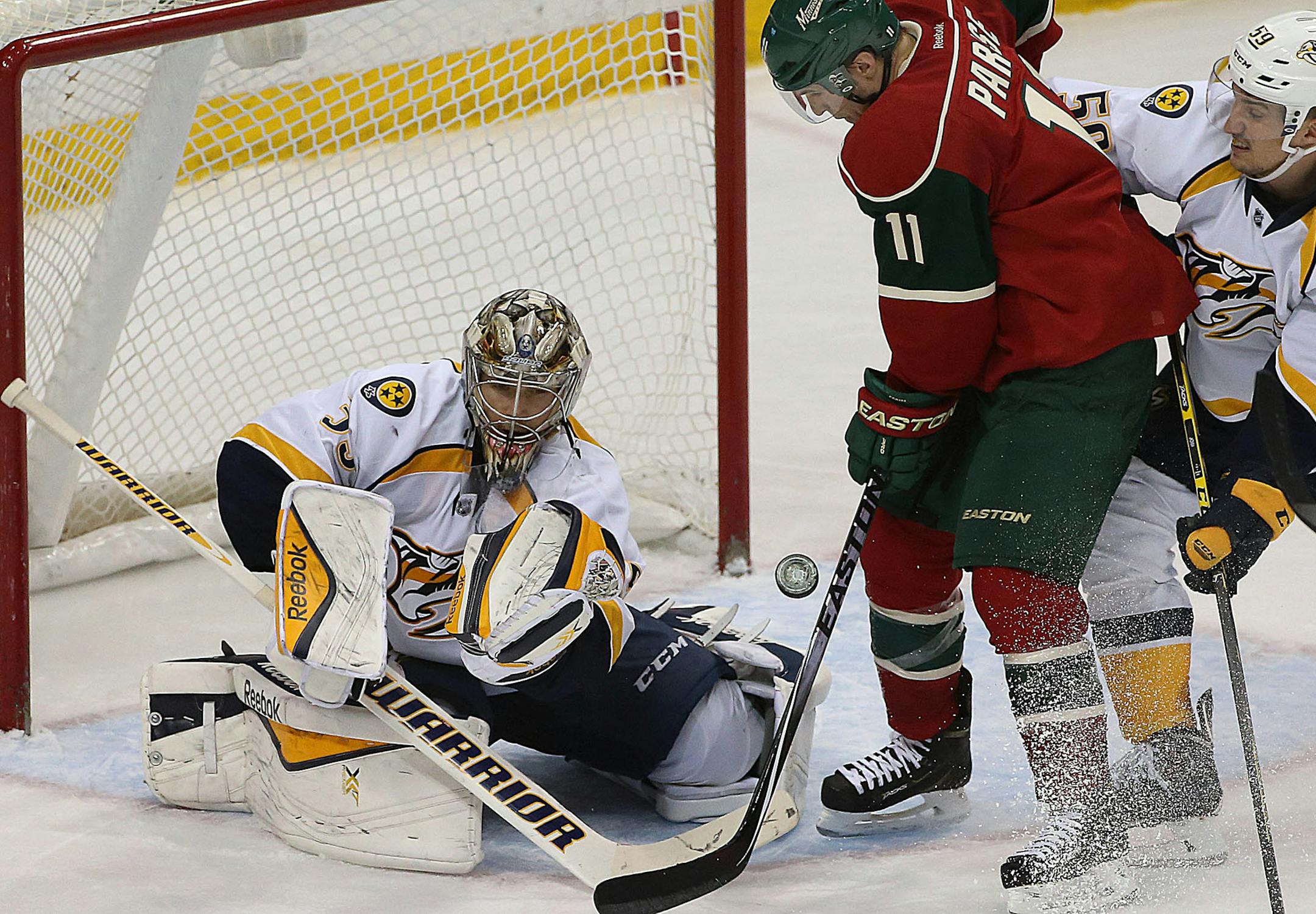 Minnesota‚Äôs Zach Parise could not get a third period shot past Nashville goalie is Pekka Rinne. Nashville defenseman Roman Josi is at right. ]JIM GEHRZ ‚Ä¢ james.gehrz@startribune.com / St. Paul, MN / January 10, 2015 /1:00 PM BACKGROUND INFORMATION: The Minnesota Wild played the Nashville Predators Saturday afternoon at the Xcel Energy Center. Nashville won the game 3-1.