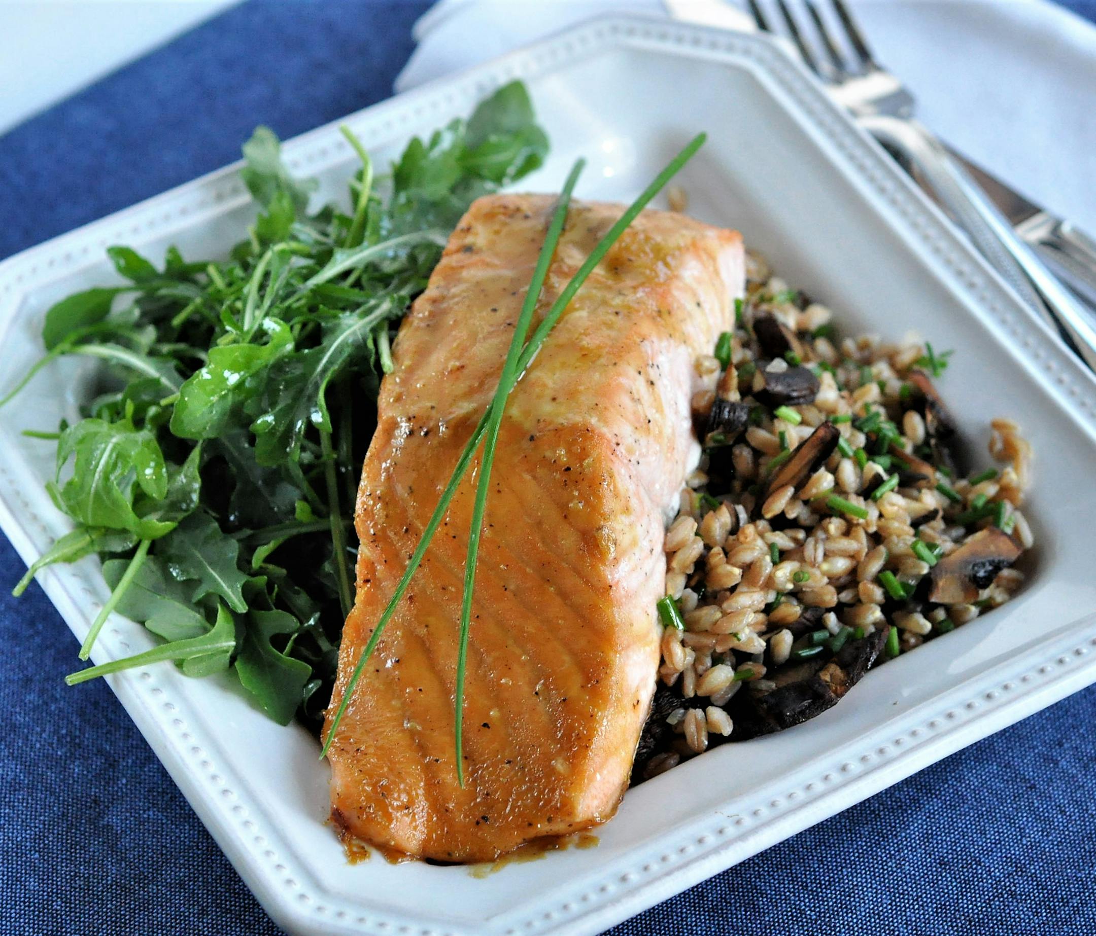 Roasted Salmon With Farro Mushroom Pilaf.