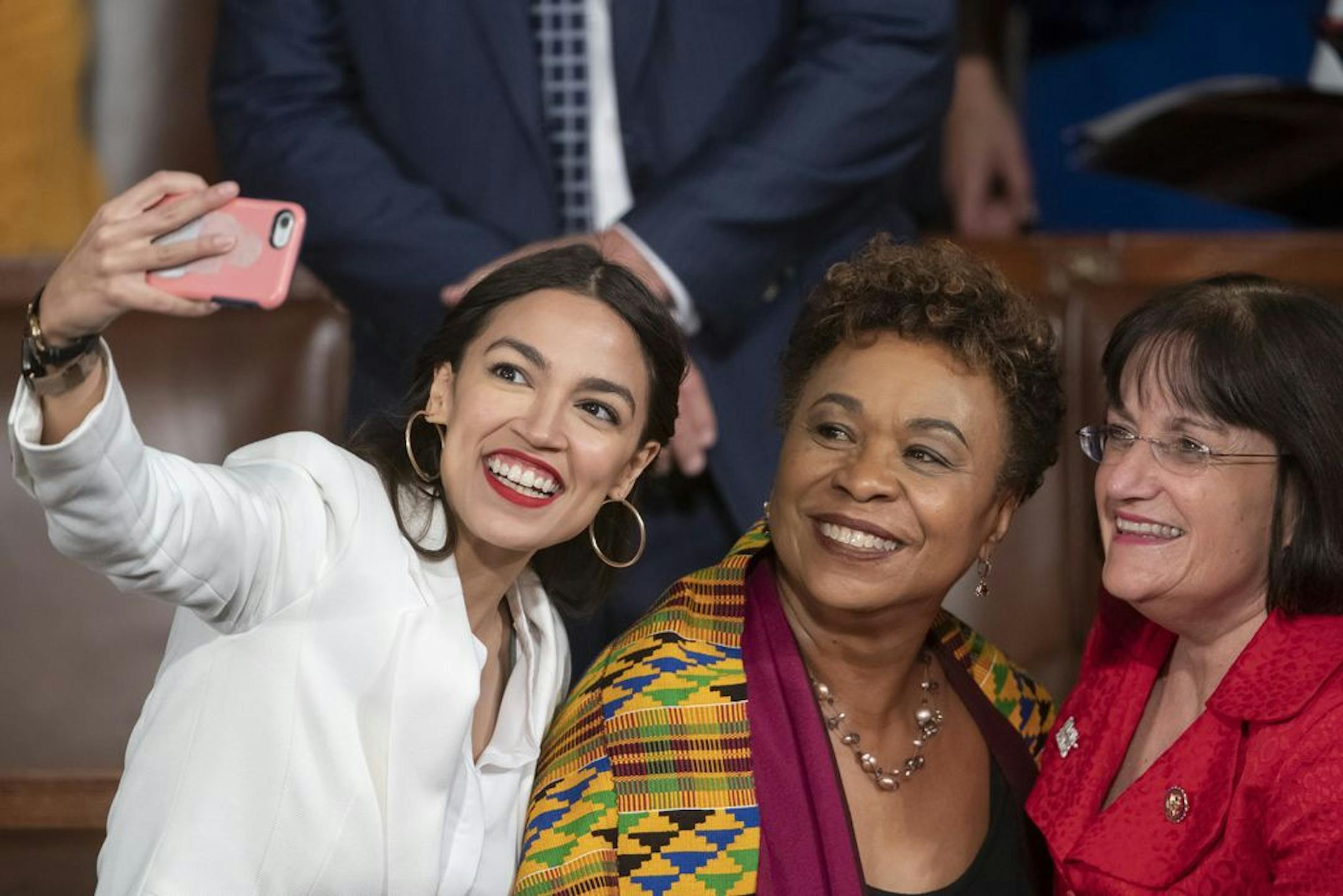 Rep.-elect Alexandria Ocasio-Cortez, a freshman Democrat representing New York's 14th Congressional District, takes a selfie with Rep. Ann McLane Kuster, D-NH, and Rep. Barbara Lee, D-Calif., on the first day of the 116th Congress with Democrats holding the majority, at the Capitol in Washington, Thursday, Jan. 3, 2019.