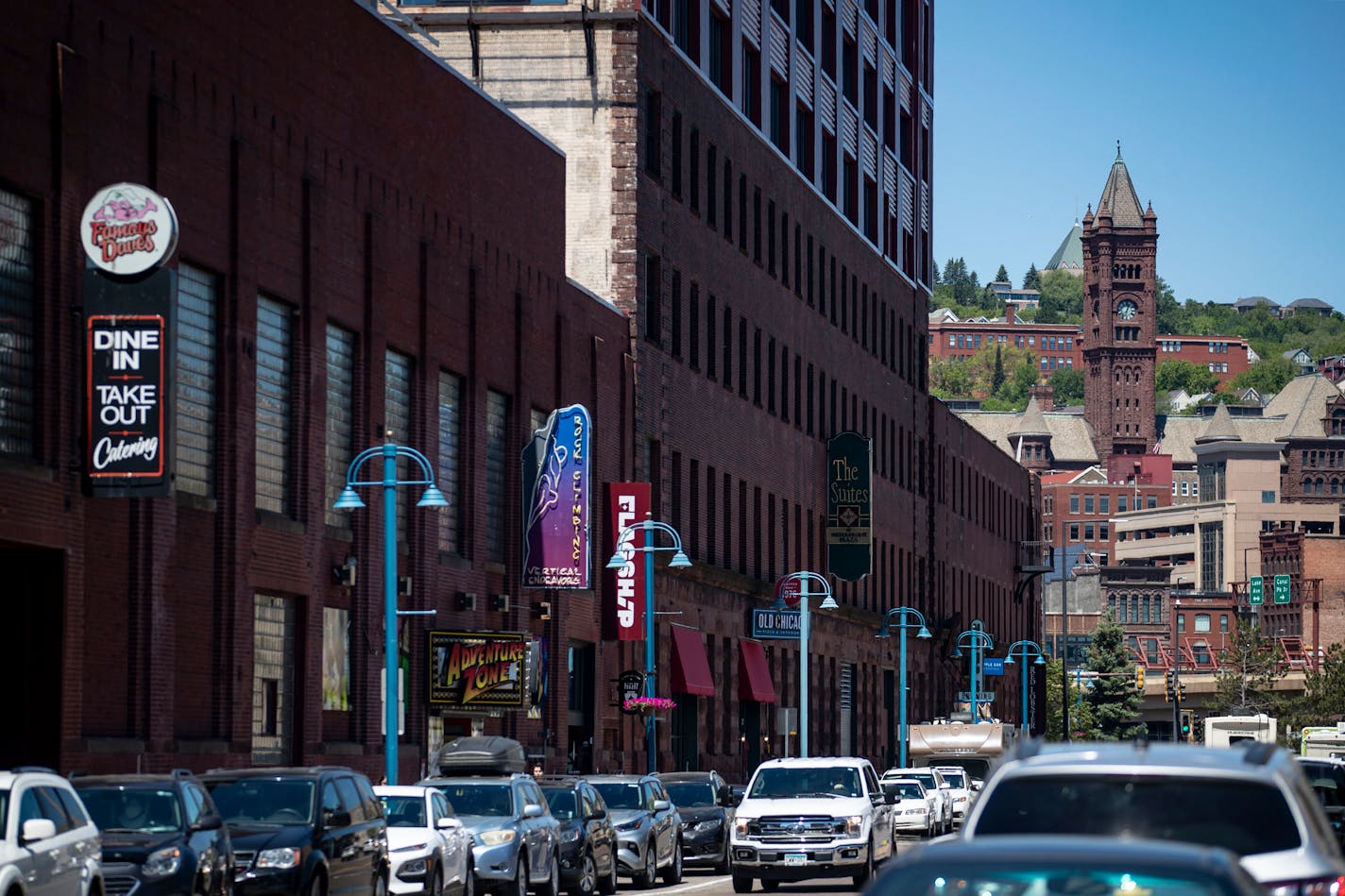 Vehicle traffic was high in Canal Park on Wednesday. Businesses have seen visitors return in droves in recent weeks and are expecting a large surge around Grandma's Marathon weekend. ]