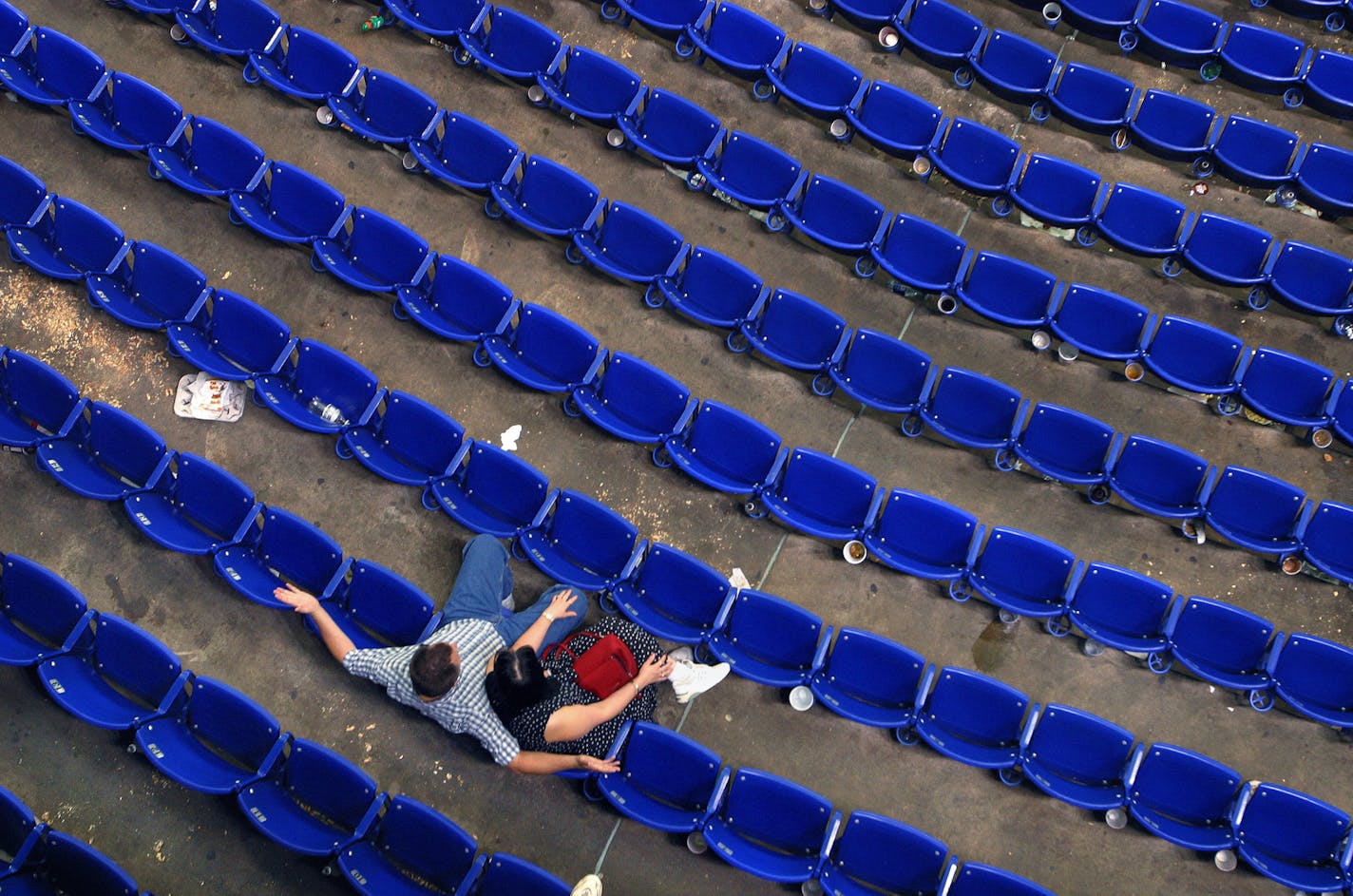 Minneapolis, MN 8/29/2002 End of the Season??? Fans linger in the metrodome seats long after the Twins were defeated by Seattle Thursday afternoon. A baseball strike could end the Twins season just short of their first playoff birth since 1991. ORG XMIT: MIN2013120519423652