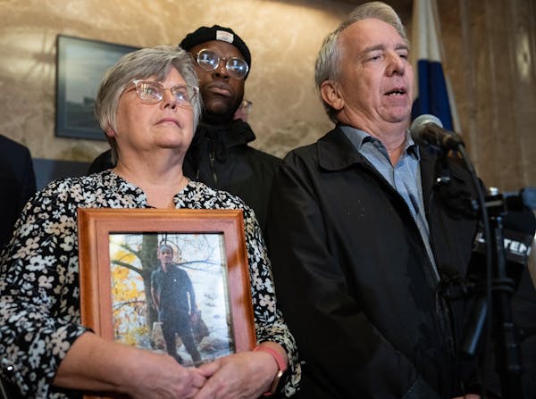 The family of Tekle Sundberg, including parents Cindy and Mark, speak during a press conference inside the Ramsey County Courthouse in Saint Paul, Min