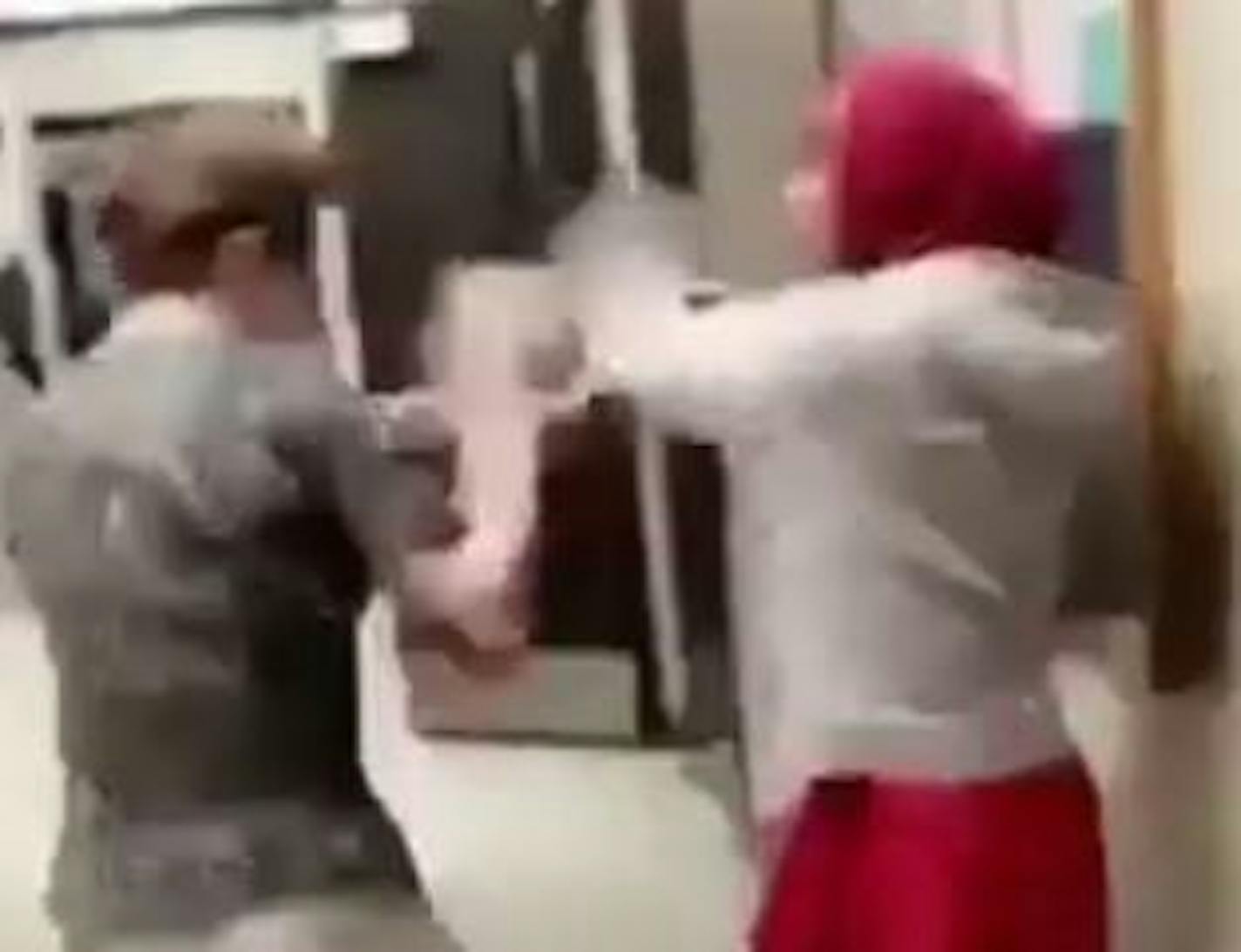 Dirk Tedmon, a spokesman for the Minneapolis school district, said Saturday that school officials who talked to families of the students after viewing the video learned that it was a "play fight" and intended as a joke.