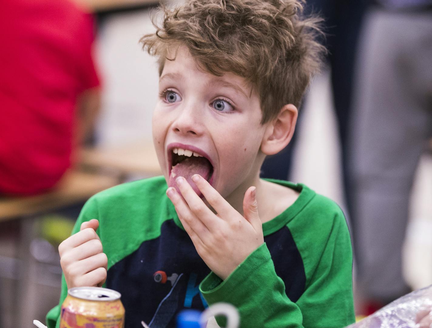 Second-grader Jude Kresl reacted to the spice level in the kimchi.