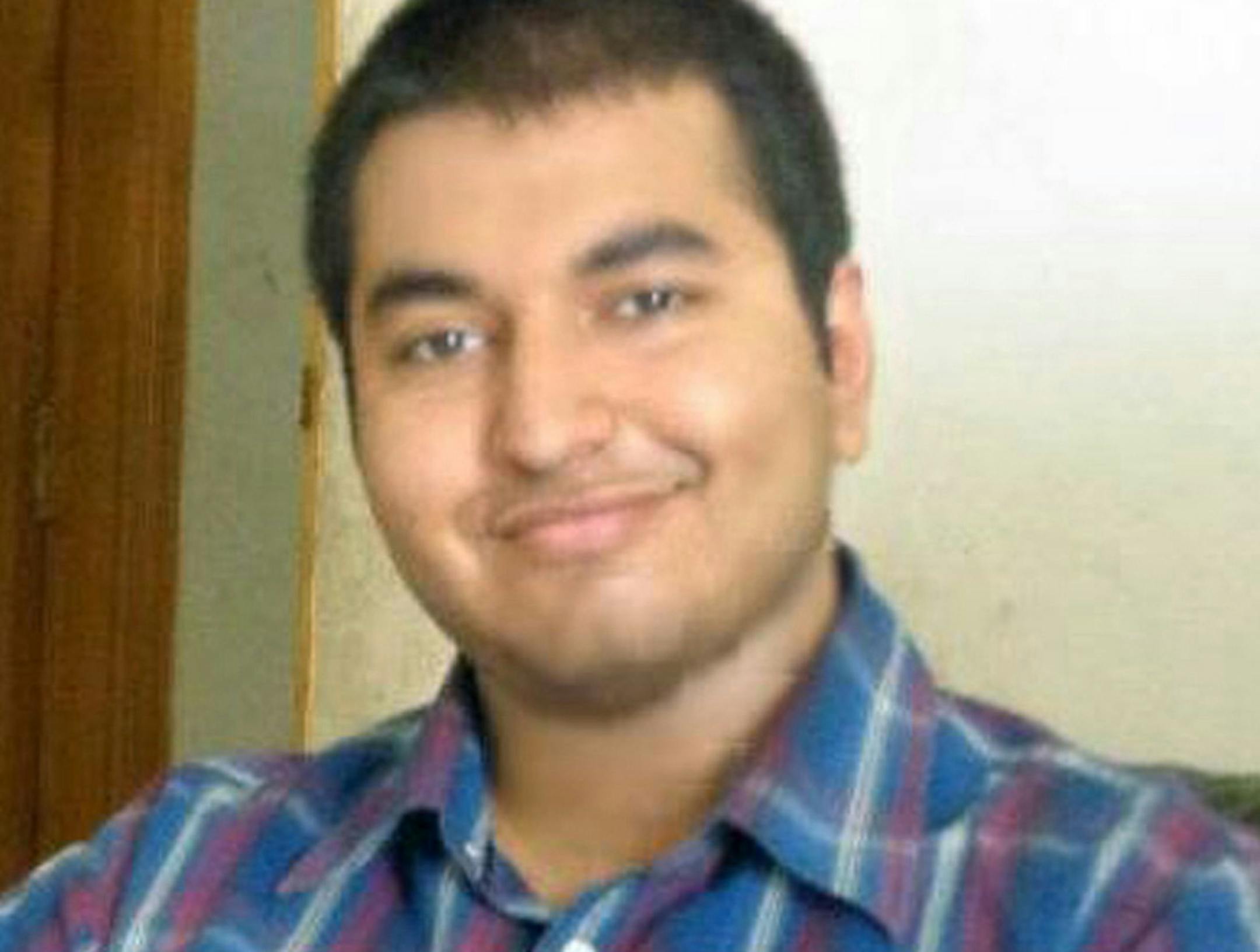 This 2013 photo provided by Shahraiz Bajwa and taken in Washington, D.C. shows Muhammad Shahzaib Bajwa, who has been comatose since being injured in a November crash while spending a semester in an exchange program at the University of Wisconsin-Superior. His family is trying to prevent the Essentia Health-St. Mary‚Äôs Medical Center in Duluth from sending him back to his home country. A hospital spokeswoman said Bajwa won‚Äôt be able to stay in the country lega