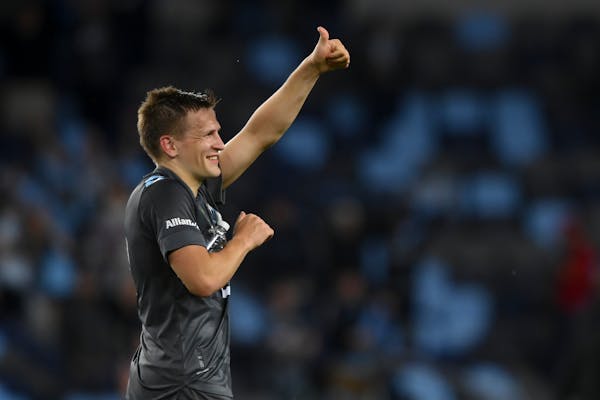 Minnesota United midfielder Robin Lod gives a thumbs-up to fans after the team's MLS soccer match against FC Dallas on Saturday, May 15, 2021, in St. 