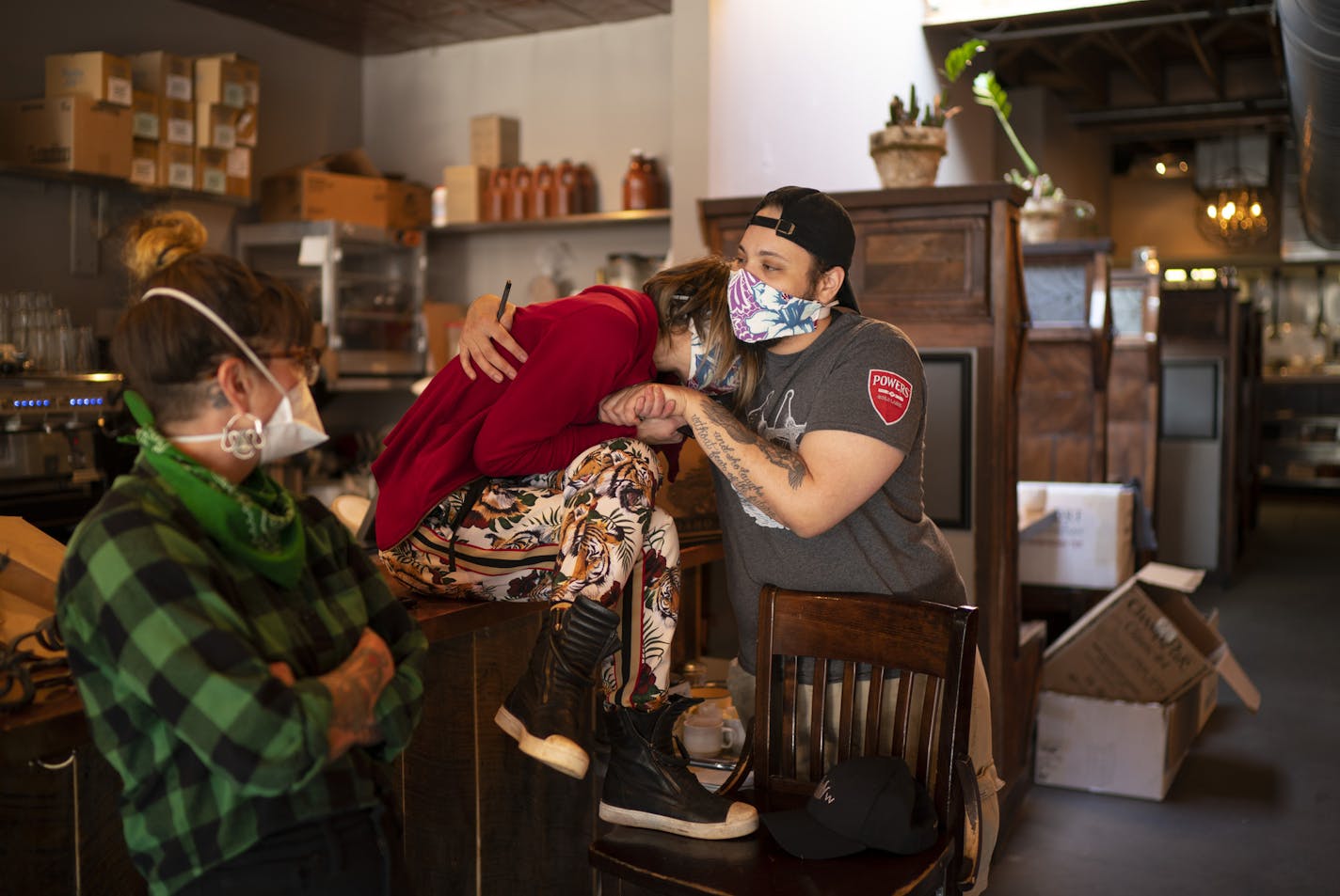 After the food was gone and the last takeout orders served, chef Rory Marino comforted co-owner Sarah Schrantz on Sunday, May 3, at Muddy Waters.