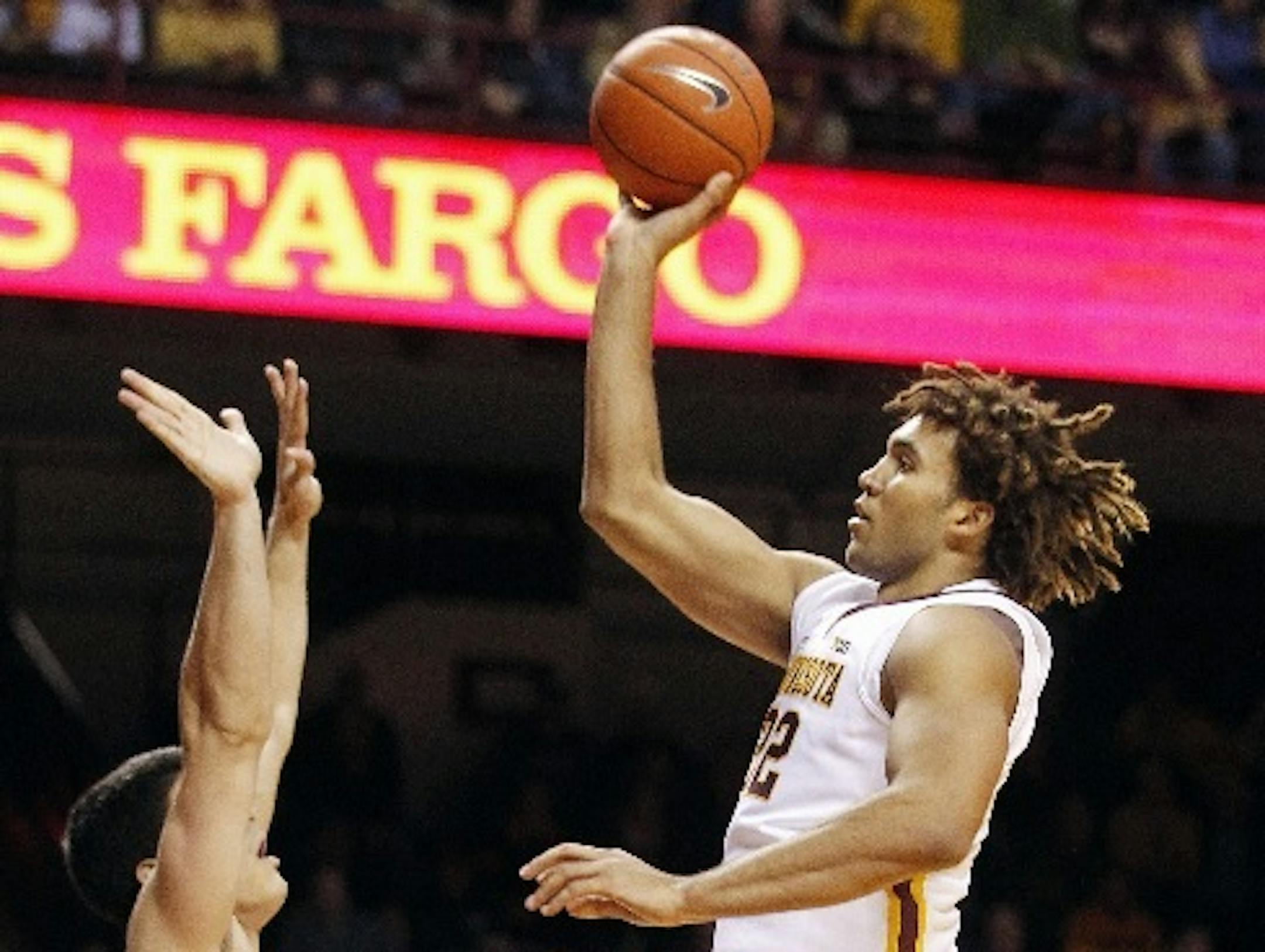 Gophers forward Reggie Lynch shot over Texas-Arlington's Jorge Bilbao during the second half Monday.