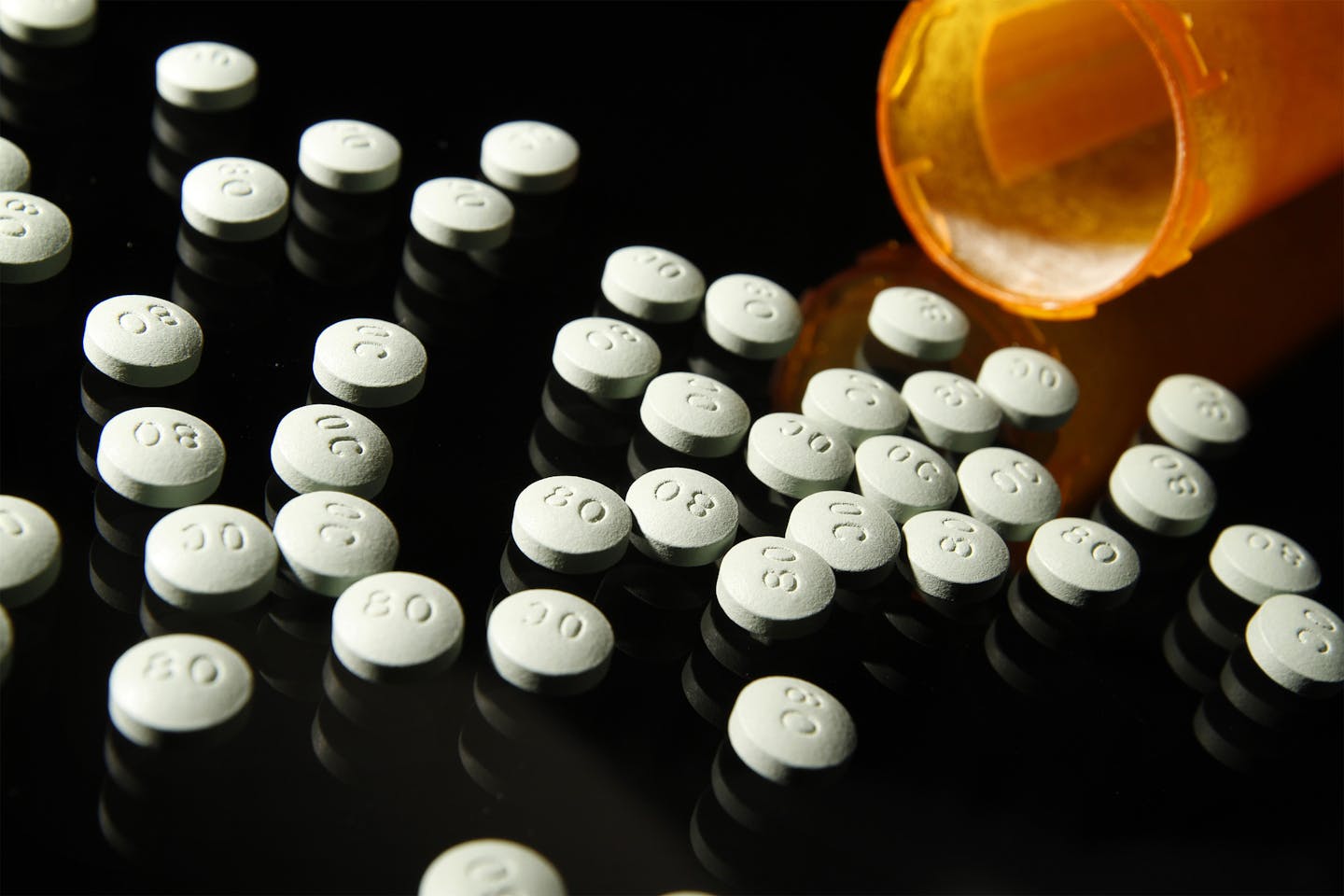 OxyContin, in 80 mg pills, in a 2013 file image. A new study suggests many people have unused painkillers in the weeks after their procedures. (Liz O. Baylen/Los Angeles Times/TNS)