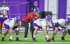 Minnesota Vikings Center Garrett Bradbury, center, took to the field for practice at the TCO Performance Center, Wednesday, May 22, 2019 in Eagan, MN.