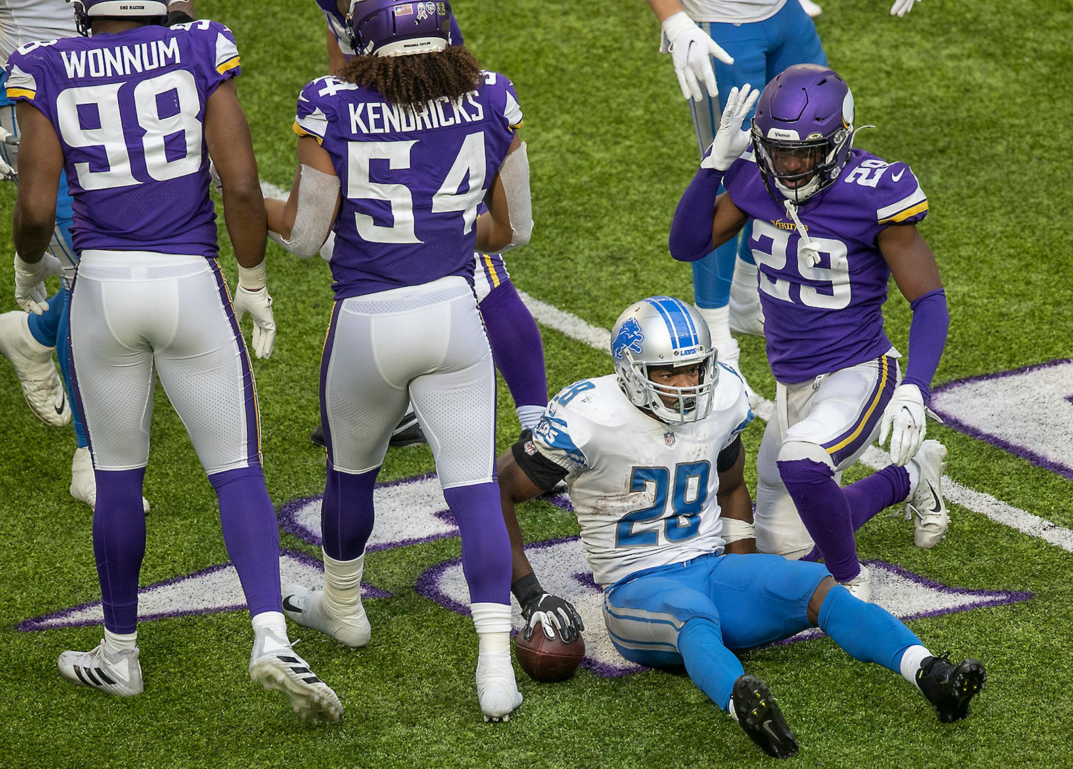 Detroit Lions running back Adrian Peterson was stopped in the third quarter.