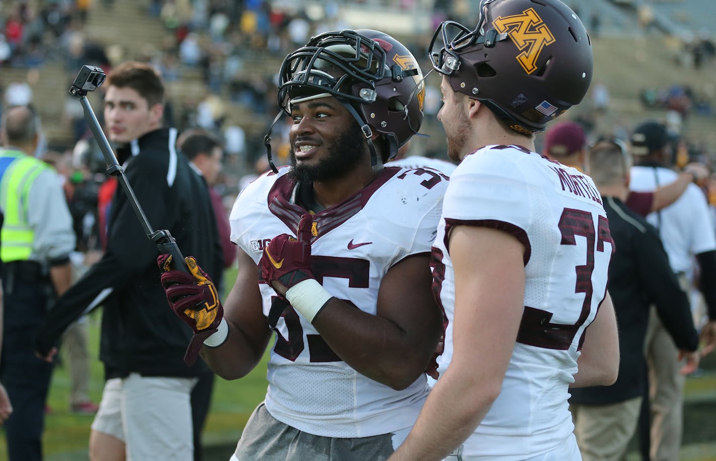 Minnesota Golden Gophers running back Rodrick Williams Jr (35) and Minnesota Golden Gophers punter Peter Mortell (37) took a photo of themselves after their win against Purdue. ] (LEILA NAVIDI/STAR TRIBUNE) leila.navidi@startribune.com Gophers vs Purdue at Ross-Ade Stadium in West Lafayette., Saturday October 10, 2015. Gophers won over Purdue 41-13 ORG XMIT: MIN1510101819310623