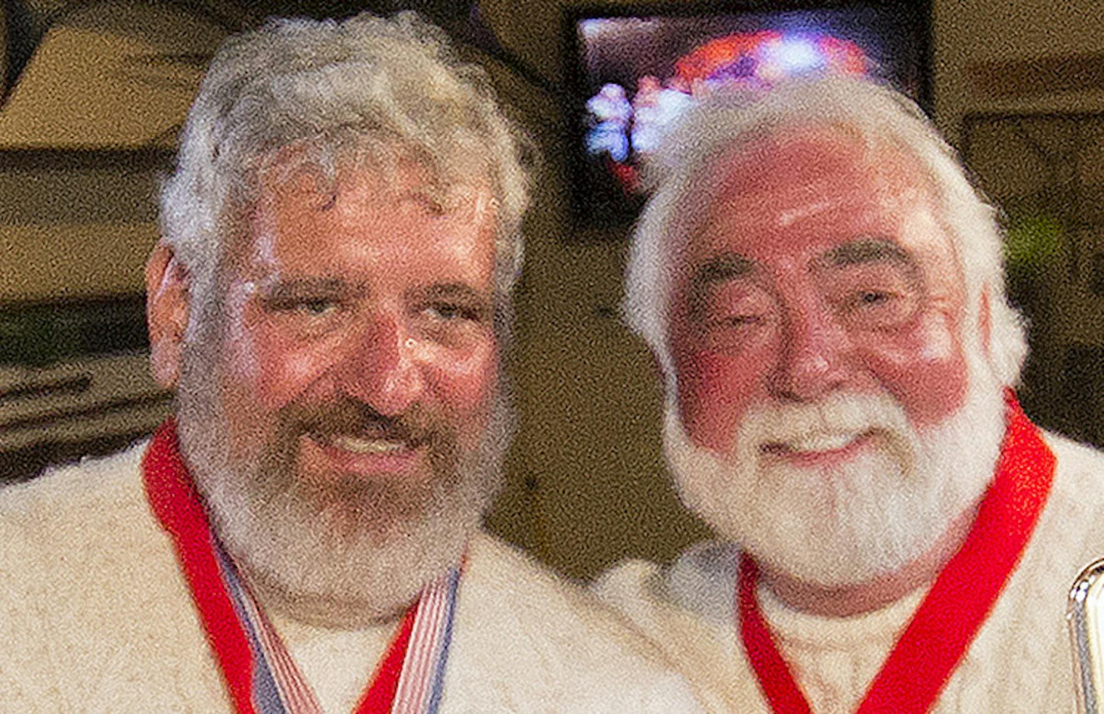 In this Saturday, July 23, 2016 photo provided by the Florida Keys News Bureau, Dave Hemingway, center, poses for smartphone photos with celebrity chef Paula Deen, left, and her husband Michael Groover, right, after Dave Hemingway won the 2016 Ernest "Papa" Hemingway Look-Alike Contest at Sloppy Joe's Bar in Key West, Fla. Success for David Hemingway came on the Macon, N.C., resident's seventh attempt. He is not related to Ernest Hemingway who lived and wrote in Key West in the 1930s. (Rob O'Nea