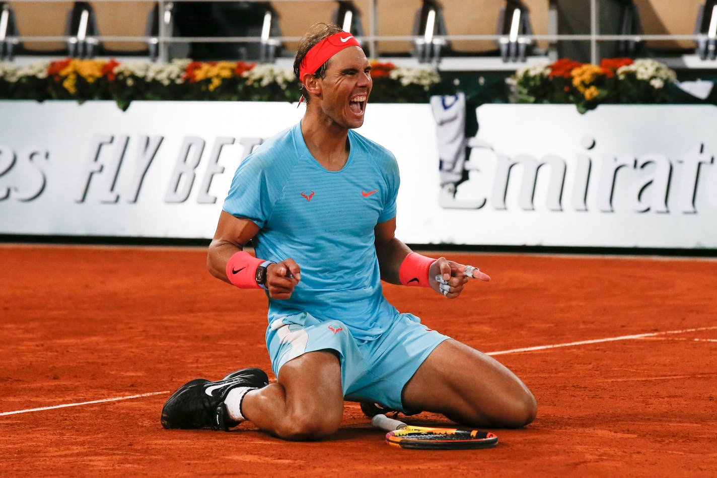 FILE - Spain's Rafael Nadal celebrates winning the final match of the French Open tennis tournament against Serbia's Novak Djokovic in three sets, 6-0, 6-2, 7-5, at the Roland Garros stadium in Paris, France, in this Sunday, Oct. 11, 2020, file photo. The AP has put together a quiz for you to test your knowledge before the clay-court major championship begins Sunday. (AP Photo/Michel Euler, File)