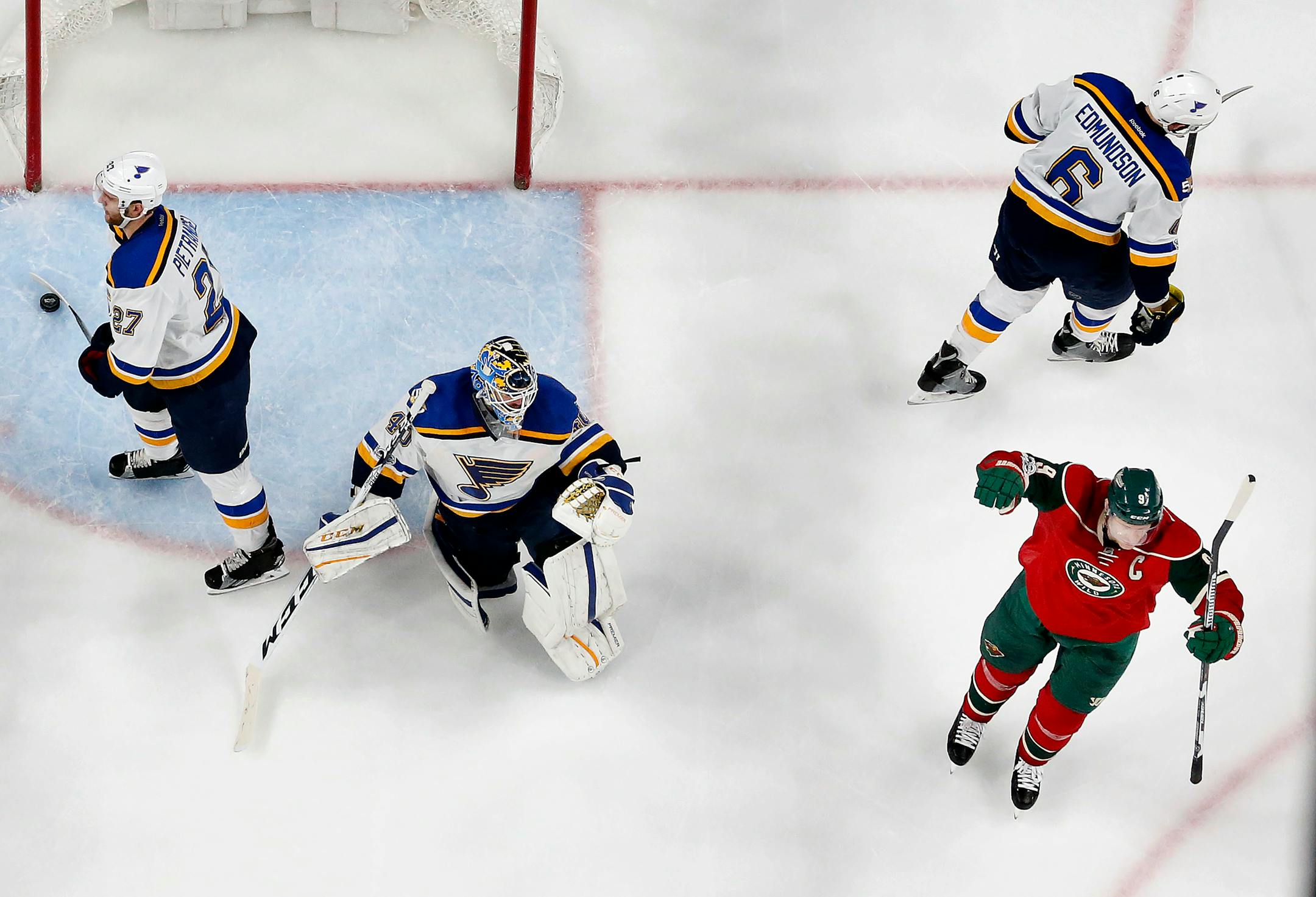 Wild center Mikko Koivu (9) celebrated a goal by Mikael Granlund in the third period of a 5-1 victory against the Blues on Thursday. ] CARLOS GONZALEZ � cgonzalez@startribune.com - January 26, 2017, St. Paul, MN, Xcel Energy Center, NHL, Hockey, St. Louis Blues at Minnesota Wild