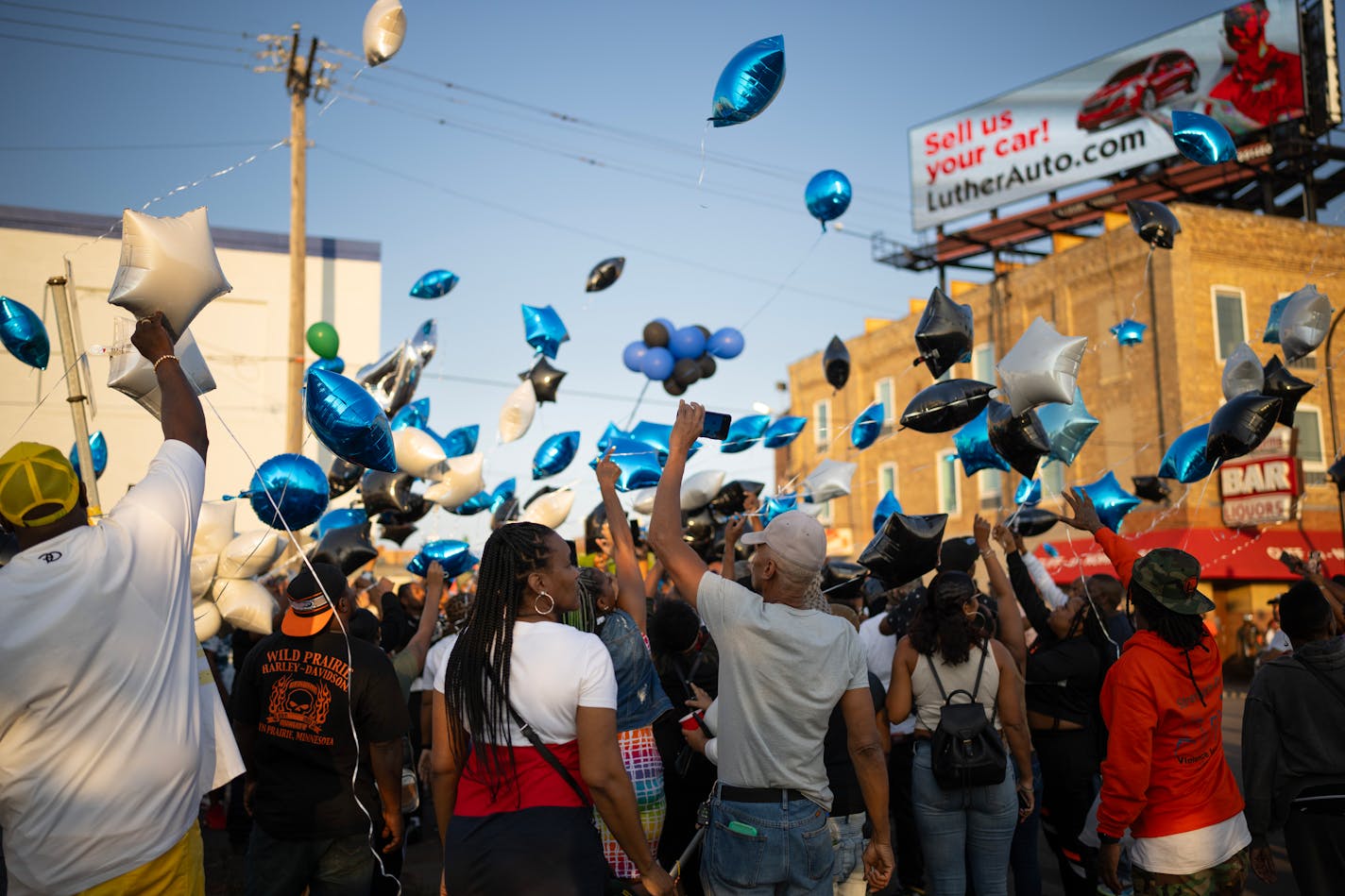 People gathered at the site of the crash for a moment of silence and to release balloons in memory of Andrew Hyde. More than 100 people attended at a vigil and balloon release Thursday night, July 20, 2023 to honor the memory of Andrew Hyde, the classic car enthusiast who was killed after his car was hit by a stolen vehicle this week. The balloon release was here he was struck, on Washington Ave. N. at 21st Ave. N. in Minneapolis. ] JEFF WHEELER • jeff.wheeler@startribune.com