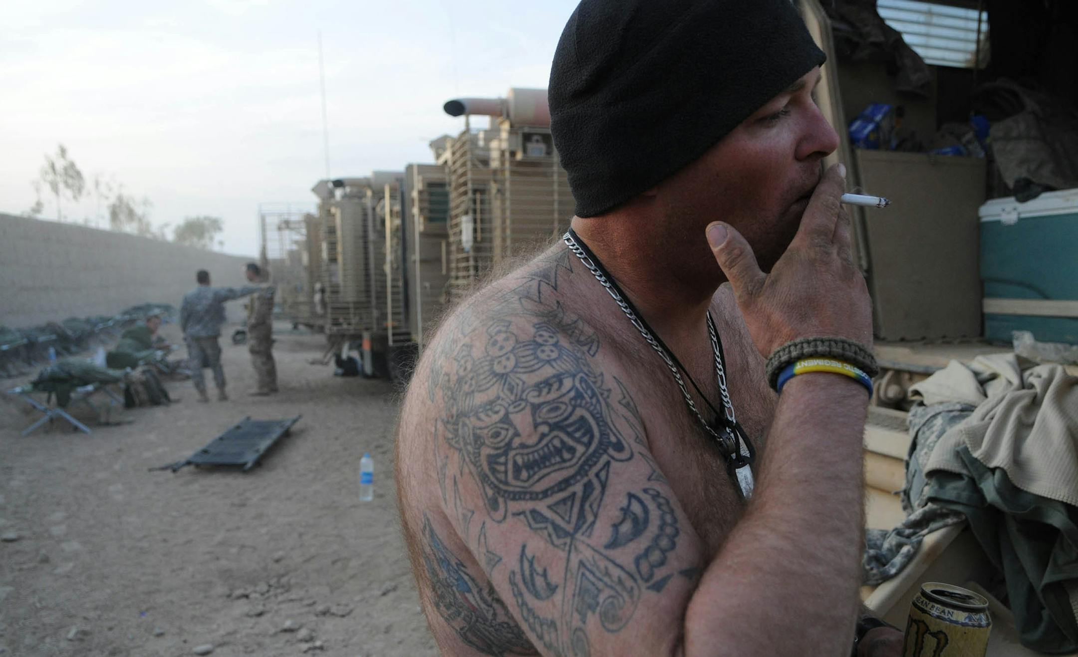Richard Sennott¬•rsennott@startribune.com] Helmand province Afghanistan 11/20/09 Sgt. Pat Rix of Duluth Minnesota smokes a cigarette during a brief pause in a 52 hr convoy mission. The 114th Transportation Company (114th TC) is a Minnesota Army National Guard Company headquartered in Duluth.This group of 187 soldiers provides ground transportation of mission essential supplies to coalition forces in forward operating bases or ( FOBS).It was a 3 mph 52-hour joint adventure between the