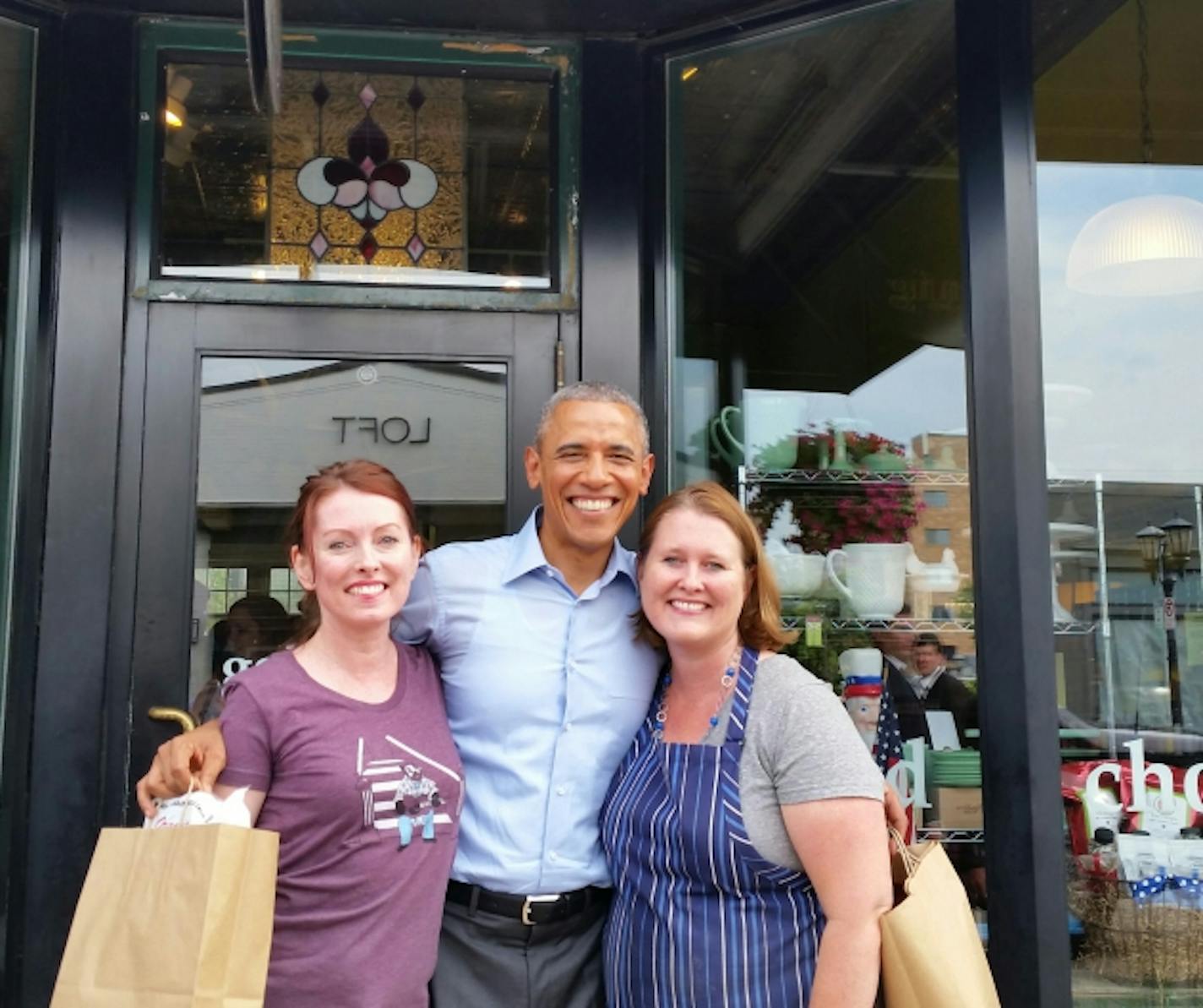 President Obama with Laurie Crowell at right, and her sister Lisa McCann, at left