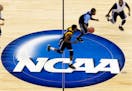 College basketball players practice leading up to an NCAA tournament game.