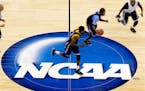 College basketball players practice leading up to an NCAA tournament game.