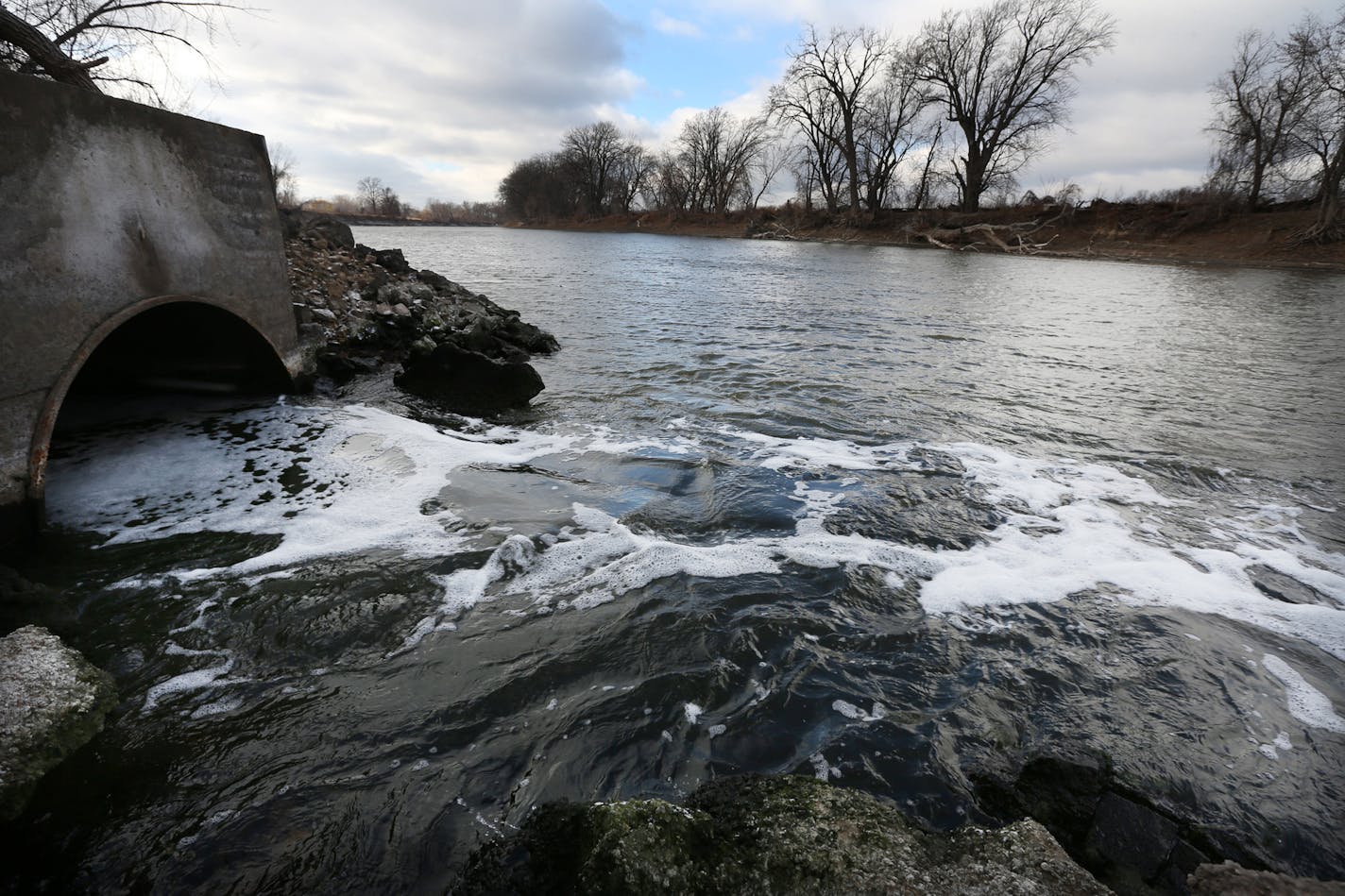 Water flows into the Minnesota River from a pipe connected to the Blue Lake treatment plant in Shakopee, MN, Monday Nov.12,2012. Phosphorus, the pollutant that sometimes made the lower Minnesota River an algae-filled dead zone, has been reduced so far that the river is healthy enough for fish, plants and other wildlife. The data, announced Monday, reflects a decade-long effort by the Minnesota Pollution Control Agency to force 40 sewage treatment plants along the last 22 miles of the Minnesota t