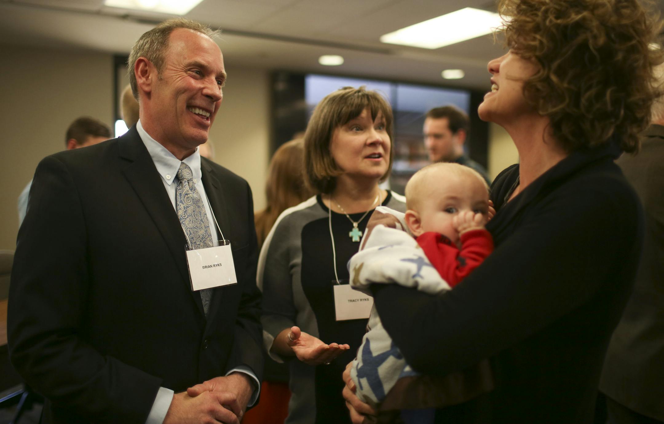 Brian Ryks and his wife, Tracy, visited with MAC commissioner Dixie Hoard at the reception in his honor Sunday afternoon. ] JEFF WHEELER ï jeff.wheeler@startribune.com Brian Ryks, the new CEO of the Metropolitan Airports Commission was the featured guest at an open house at MAC headquarters in Minneapolis Sunday afternoon, March 20, 2016. Ryks, a native Minnesotan, will take over as MAC chief in May. He is currently the Executive Director of the airport in Grand Rapids, MI.