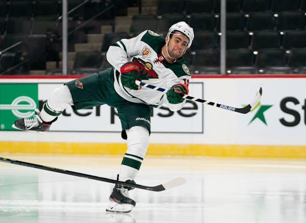 The Wild's Jordan Greenway took a shot attempt during a scrimmage at Xcel Energy Center on Friday.