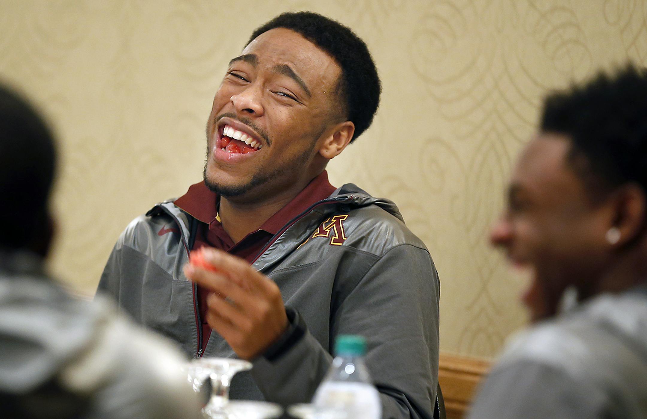 Gophers Cedric Thompson laughed with his teammates during the dinner hour at Hawthorne Suite Hotel, Friday, October 24, 2014 in Champaign, IL. ] (ELIZABETH FLORES/STAR TRIBUNE) ELIZABETH FLORES ‚Ä¢ eflores@startribune.com ufot110214 ORG XMIT: MIN1410281122036182