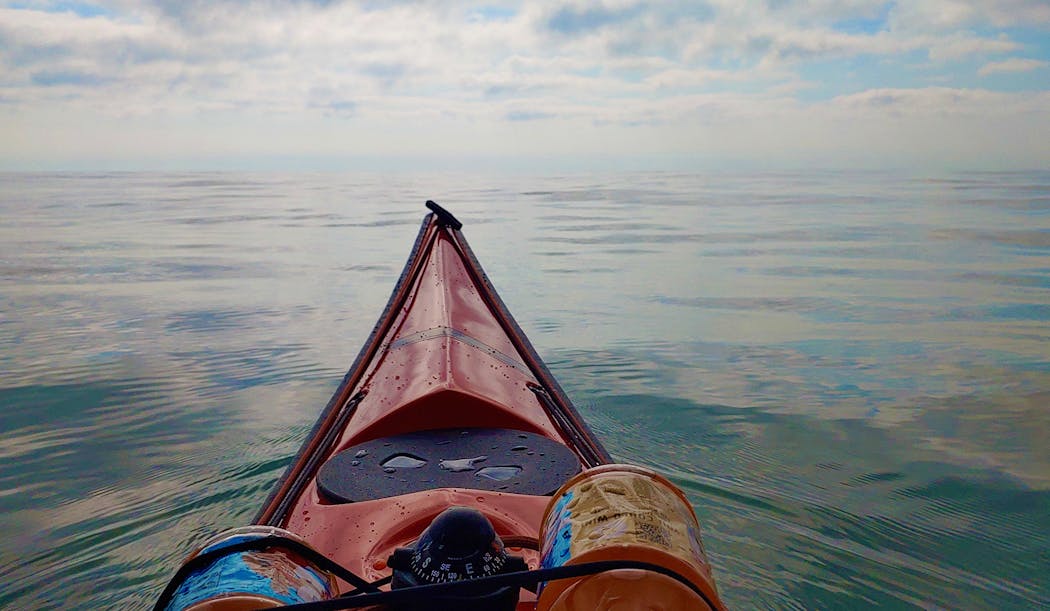 Conditions were relatively calm shortly after Stout launched his kayak July 24 on the Wisconsin shore of Lake Michigan. But, as Stout has come to expect, things can change quickly on the Great Lakes.