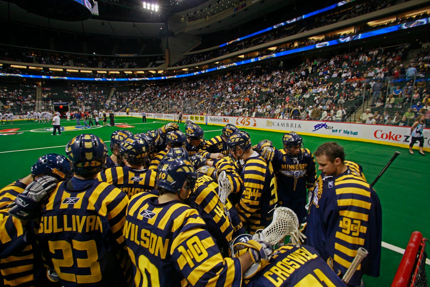 Members of the Minnesota Swarm lacrosse team huddled before a game in 2009. The team will relocate to a yet-to-be-determined location for the 2016 season.