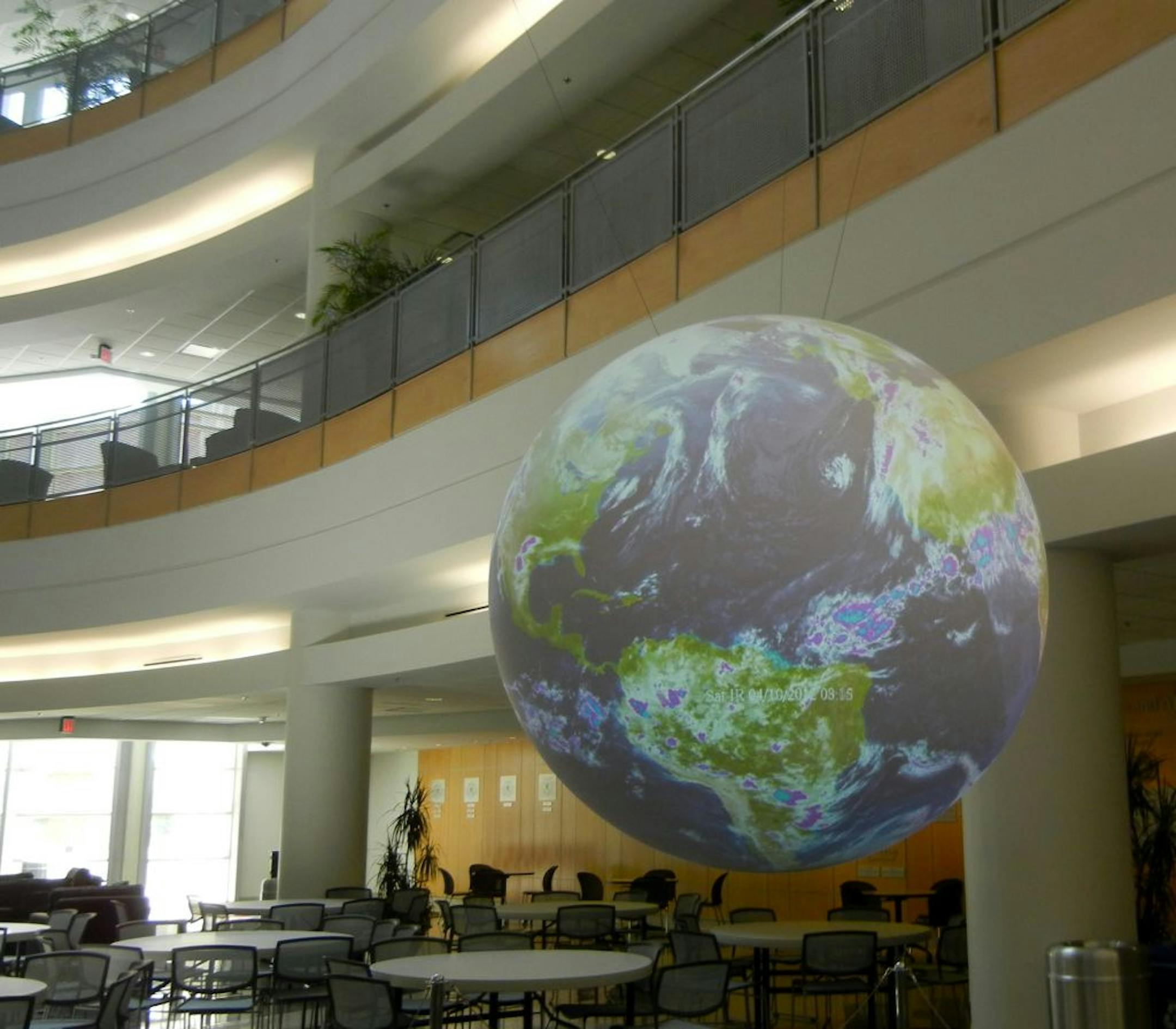 Science on a Sphere -- a six-foot-diameter suspended globe exhibiting the current weather in movement -- is the centerpiece of the lobby at the National Weather Service in Norman, Okla.