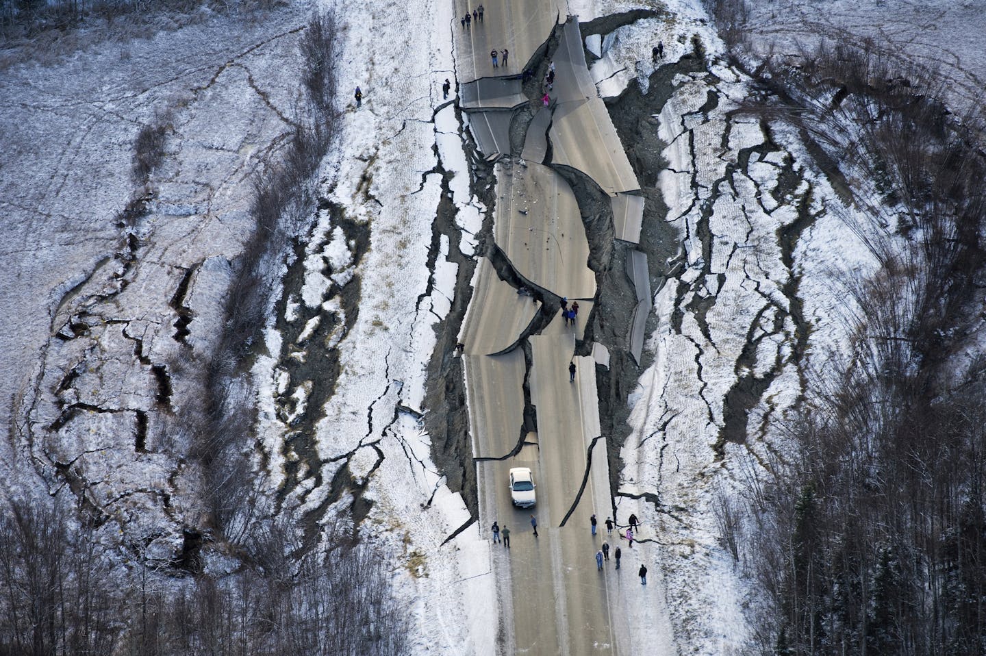 This aerial photo shows damage on Vine Road, south of Wasilla, Alaska, after earthquakes Friday, Nov. 30, 2018. Back-to-back earthquakes measuring 7.0 and 5.7 shattered highways and rocked buildings Friday in Anchorage and the surrounding area, sending people running into the streets and briefly triggering a tsunami warning for islands and coastal areas south of the city.