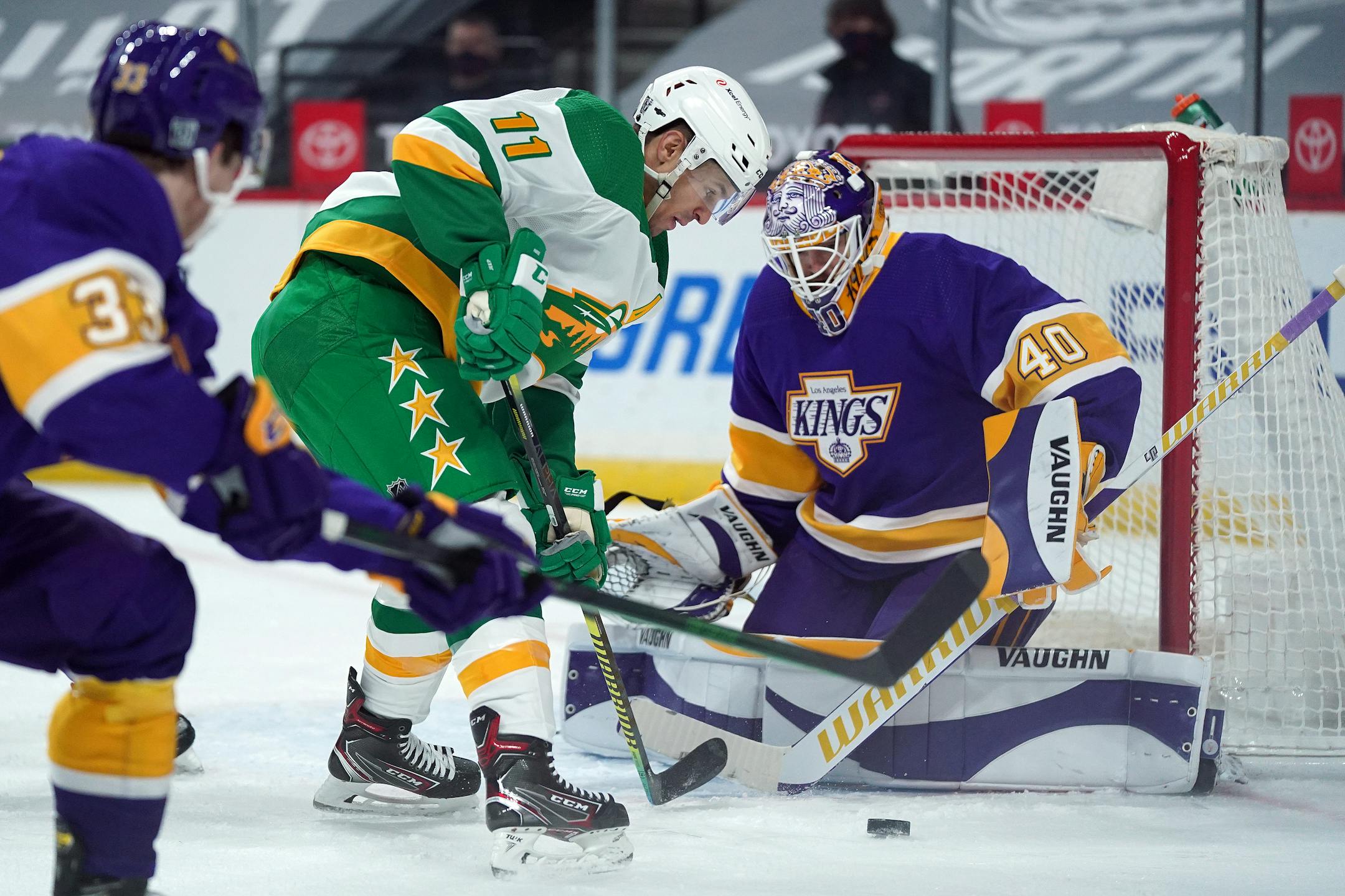 Minnesota Wild left wing Zach Parise tried to regain control of the puck as he looked to take a shot on Los Angeles Kings goaltender Calvin Petersen in the second period.