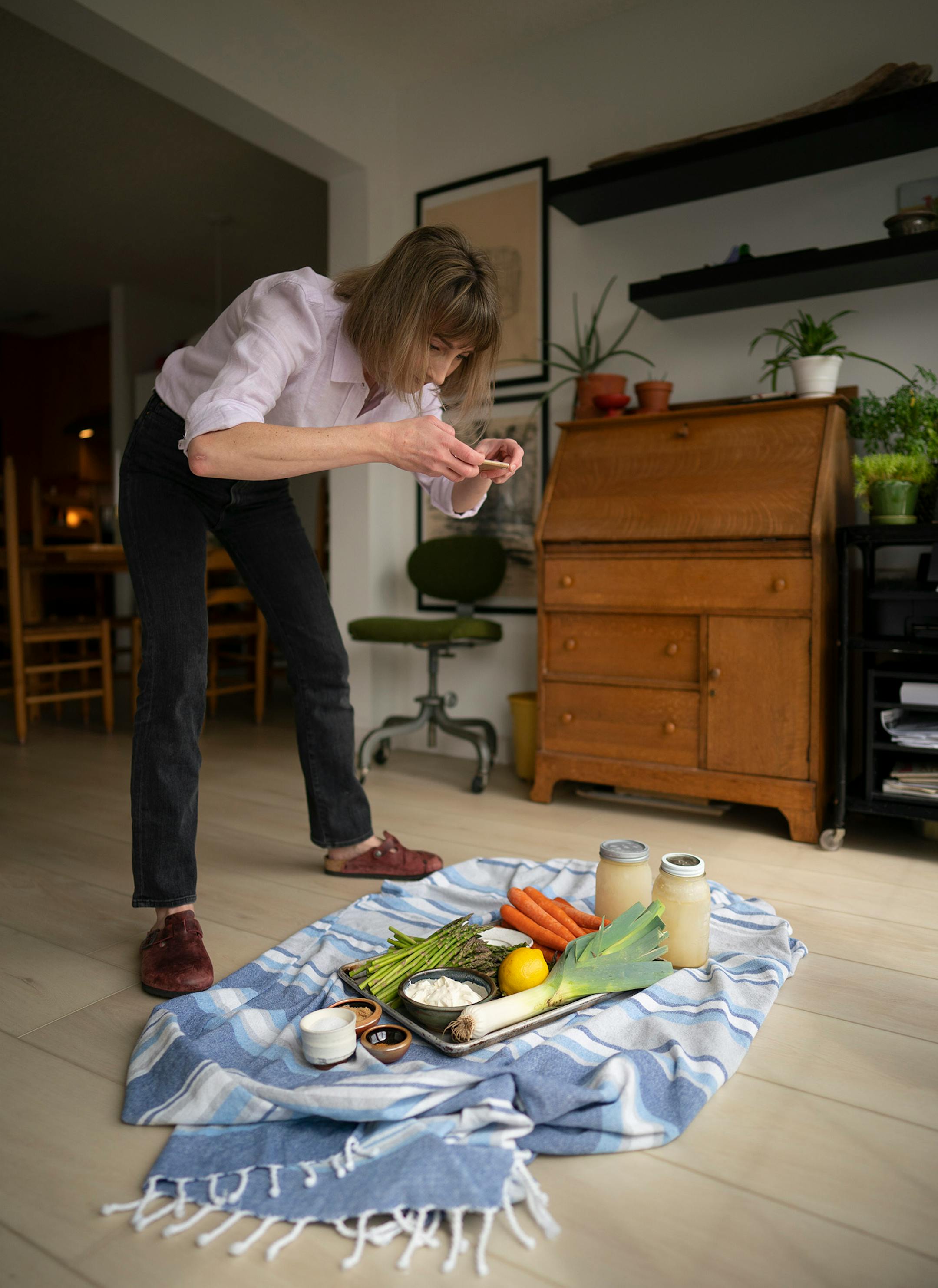 Karyn Tomlinson shot an overhead still of her ingredients, her mise en place, before she began the task of filming herself making two different pureed soups. Since the pandemic began, former Corner Table chef Karyn Tomlinson has been a prolific poster to Instagram, offering free cooking lessons with her show "Karyn's Quarantine Kitchen." She was photographed producing a segment on preparing pureed soups Thursday afternoon, April 23, 2020 in the kitchen of her condo.