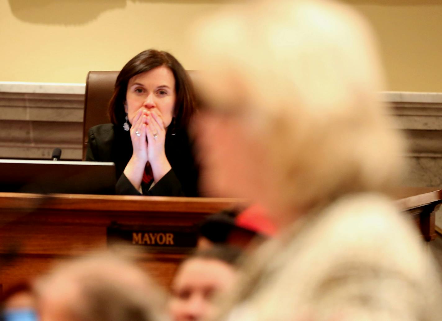 Mayor Betsy Hodges listened to community comments during a packed meeting on the budget in the city council chambers at City Hall in Minneapolis, Minn. on Wednesday, December 10, 2014. ] RENEE JONES SCHNEIDER reneejones@startribune.com