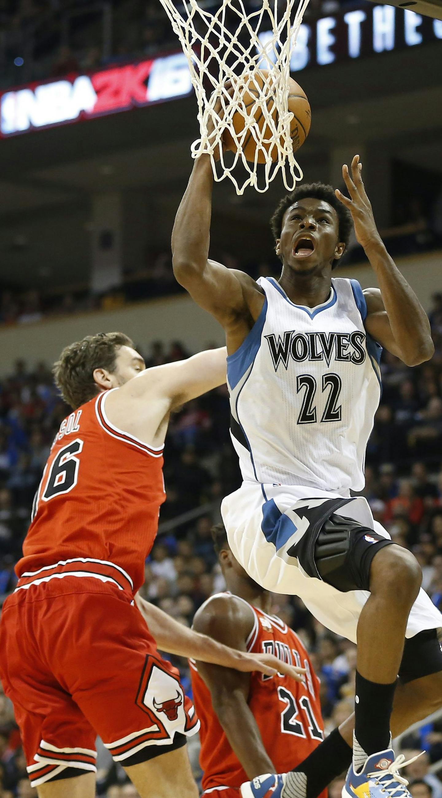 Minnesota Timberwolves' Andrew Wiggins, (22) goes up for two against Chicago Bulls' Pau Gasol (16) during the first half of an NBA preseason basketball game, Saturday, Oct. 10, 2015 in Winnipeg, Manitoba. (John Woods/The Canadian Press via AP) MANDATORY CREDIT